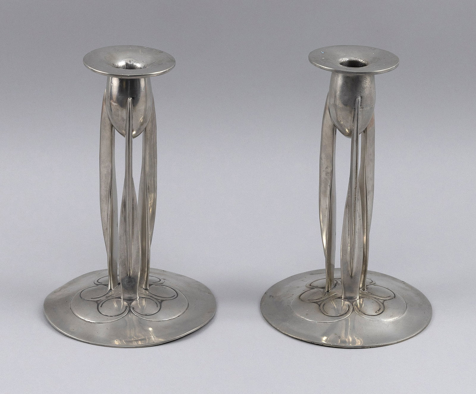 PAIR OF ARCHIBALD KNOX FOR LIBERTY & CO. LTD. PEWTER CANDLESTICKS London, Late 19th/Early 20th (1 of 5)
