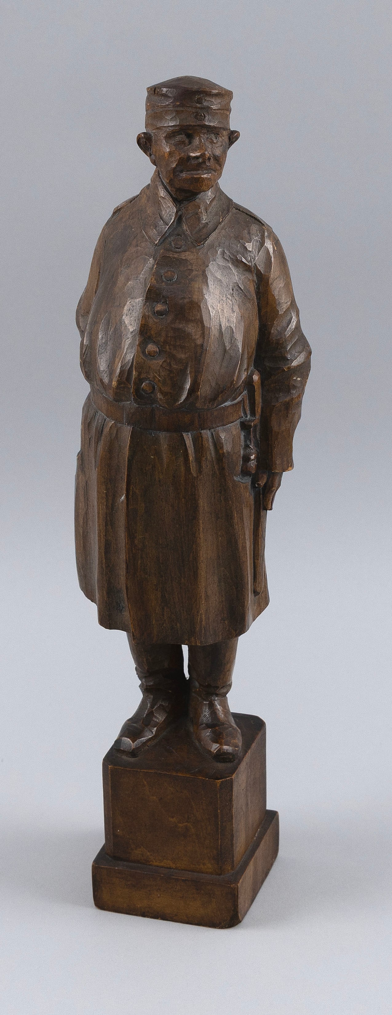 A. BOHLIG (Germany, Late 19th/Early 20th Century), Carved figure of a butcher., Height 14.5". Base: A. BOHLIG Germany, Late 19th/Early 20th Century Carved figure of a butcher. Signed and dated 1914 on base. Height 14.5". Base 2.675" x 2.675".