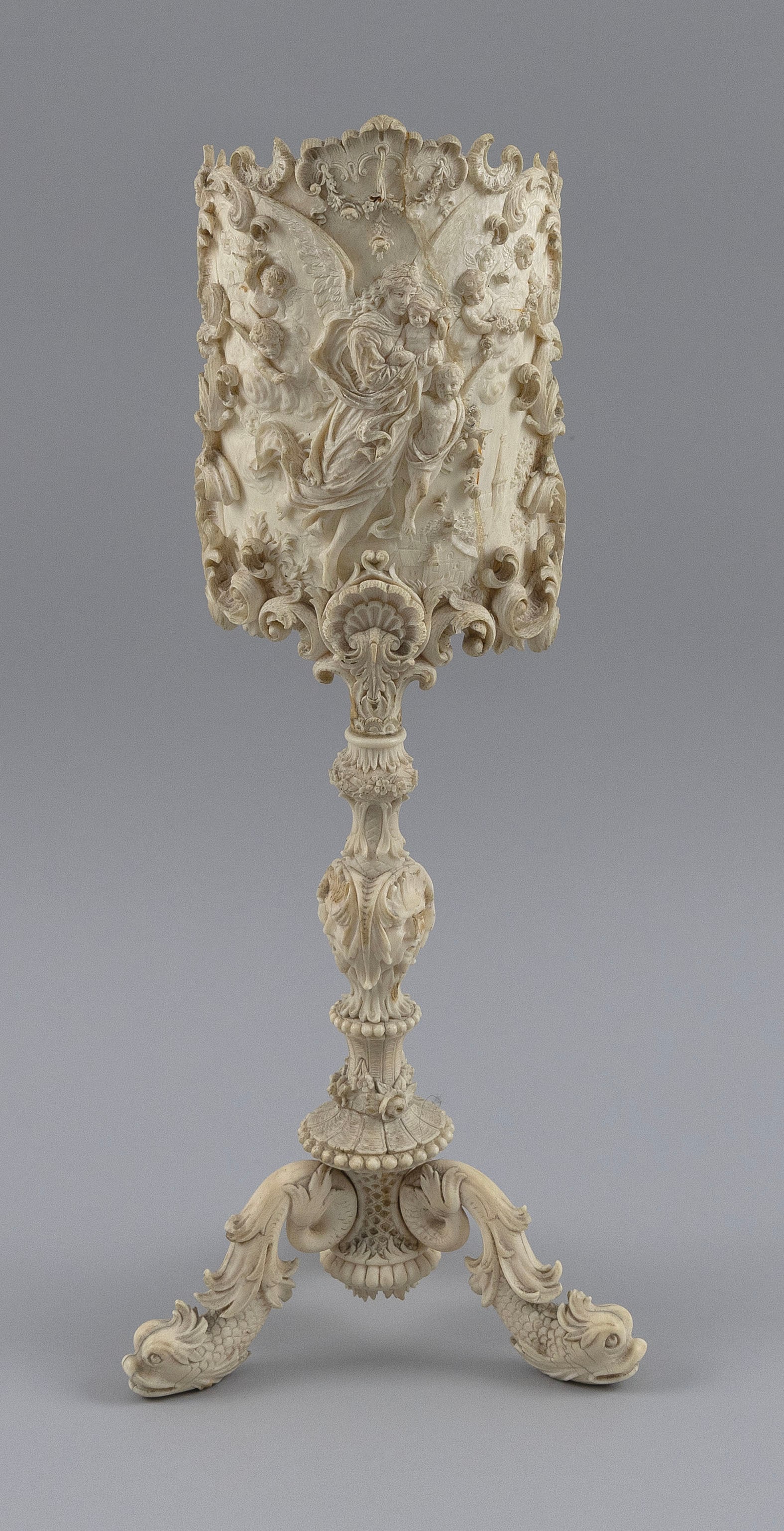 CONTINENTAL CARVED IVORY CANDLE SCREEN 19th Century Height 14". Width 6".: Y Y CONTINENTAL CARVED IVORY CANDLE SCREEN 19th Century Exquisite carving of cherubs. Height 14". Width 6". CITES is a multilateral treaty to protect endangered plants and animals. CITES is a multilat