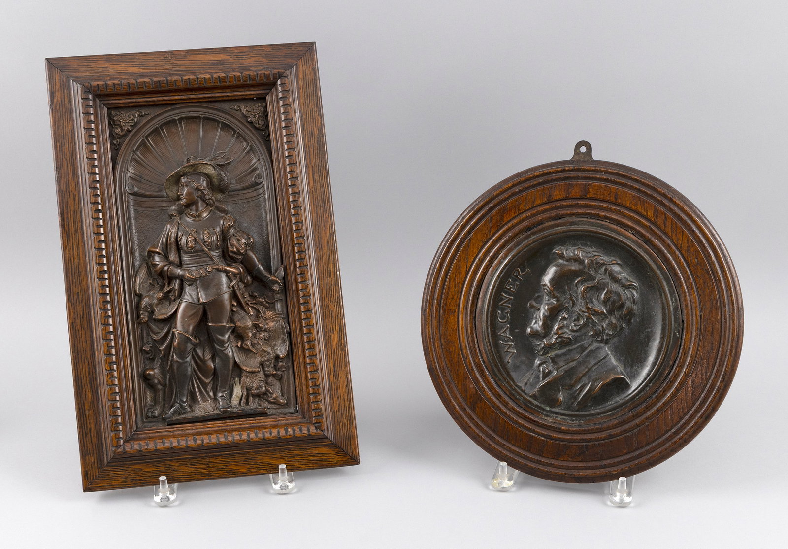 TWO CONTINENTAL BRONZE-FINISH PLAQUES Late 19th Century (1 of 2)