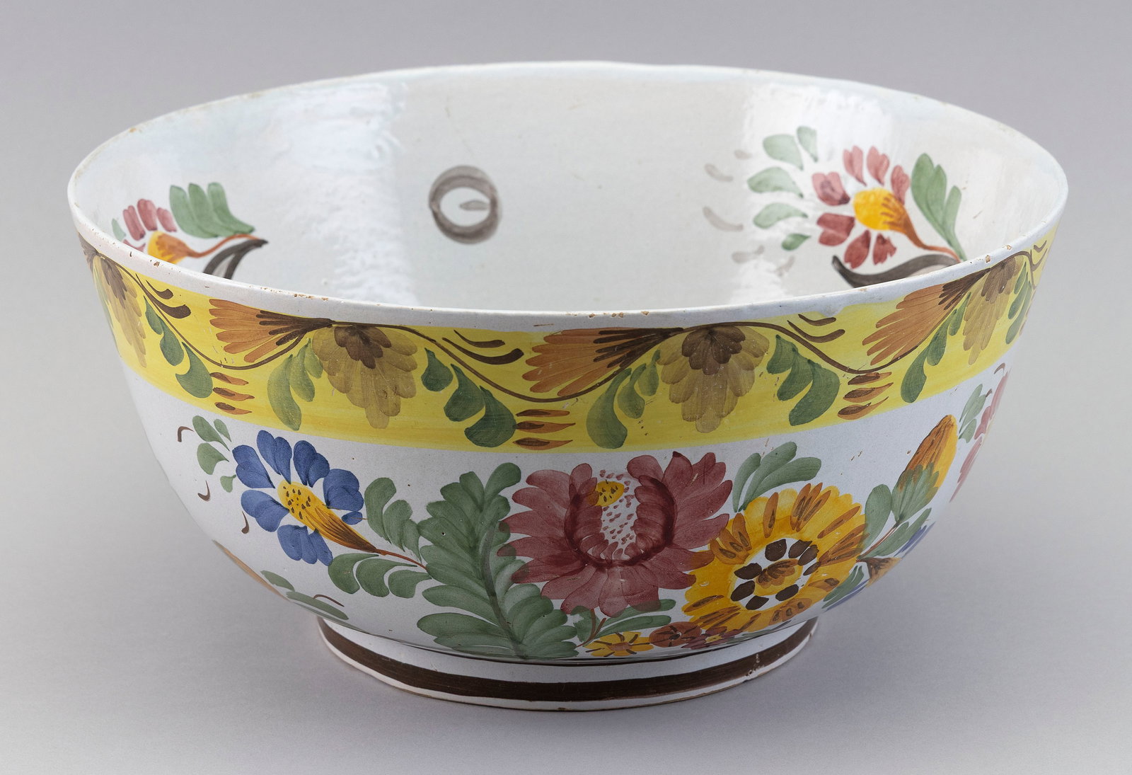 LARGE DELFT POLYCHROME FOOTED BOWL The Netherlands, Early 19th Century Height 6". Diameter 13". (1 of 4)