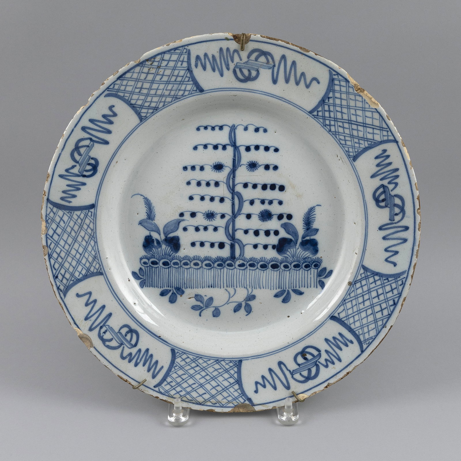 DELFT BLUE AND WHITE CHARGER The Netherlands, 19th Century Diameter 14.25".: DELFT BLUE AND WHITE CHARGER The Netherlands, 19th Century Diameter 14.25". Provenance: The Estate of Paul and Diane Madden, Sandwich, Massachusetts.
