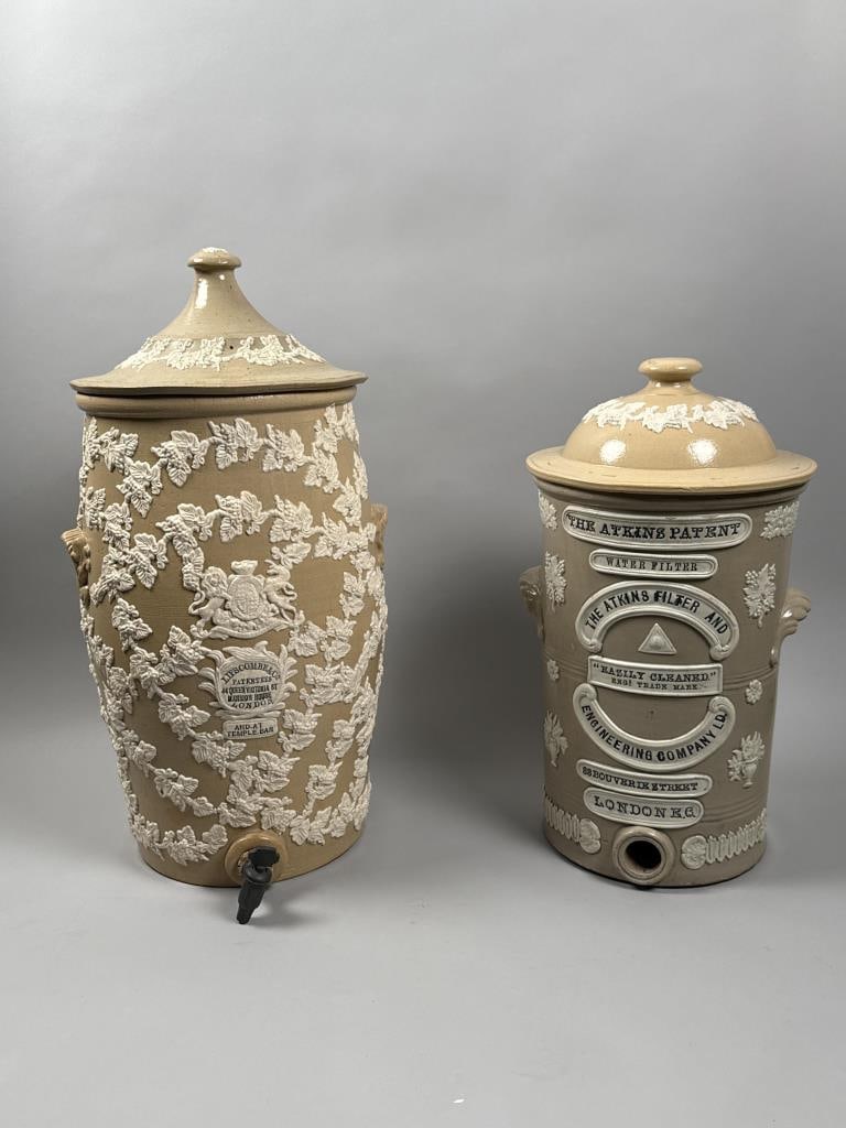 TWO ENGLISH STONEWARE WATER COOLERS 19th Century Heights 24" and 26". (1 of 3)