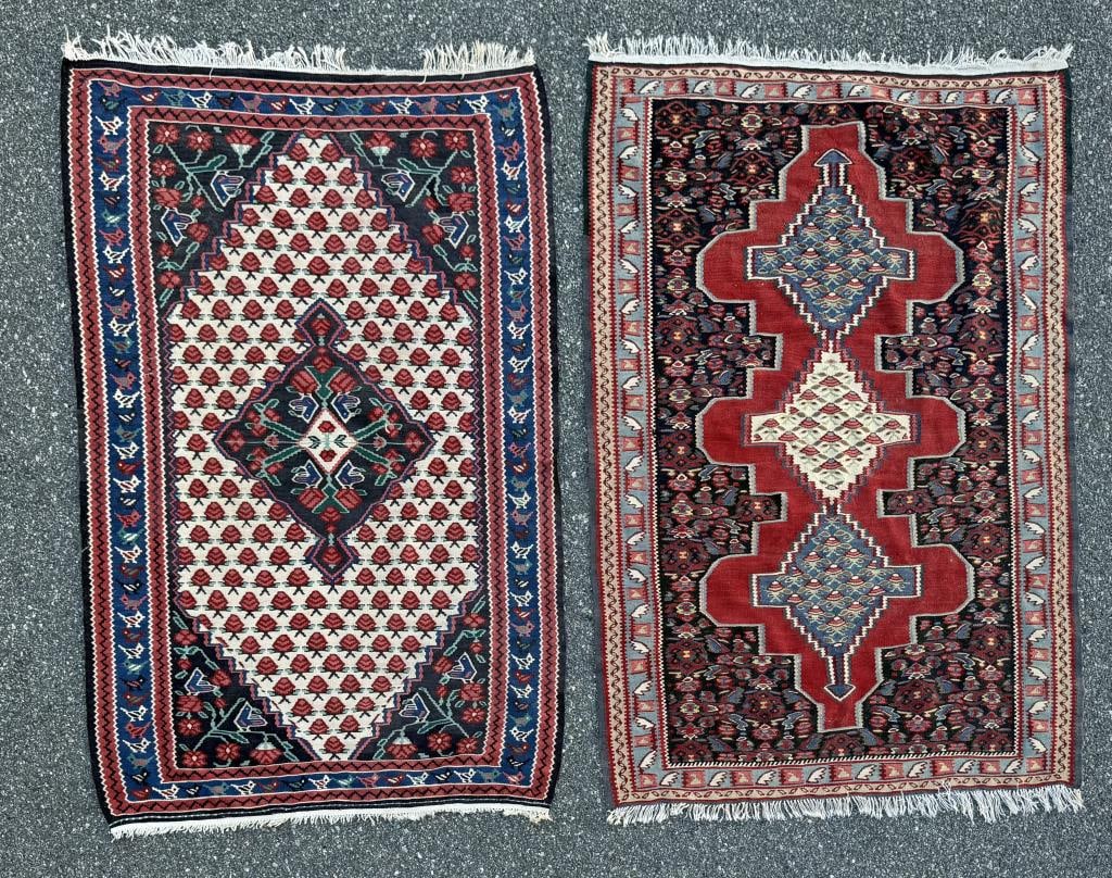 TWO KILIM RUGS: 5'3" X 3'9" AND 5'2" X 3'6" 20th Century: TWO KILIM RUGS: 5'3" X 3'9" AND 5'2" X 3'6" 20th Century Both in a traditional Oriental rug design, one with three medallions and the other with a single medallion on a diamond-shaped field.