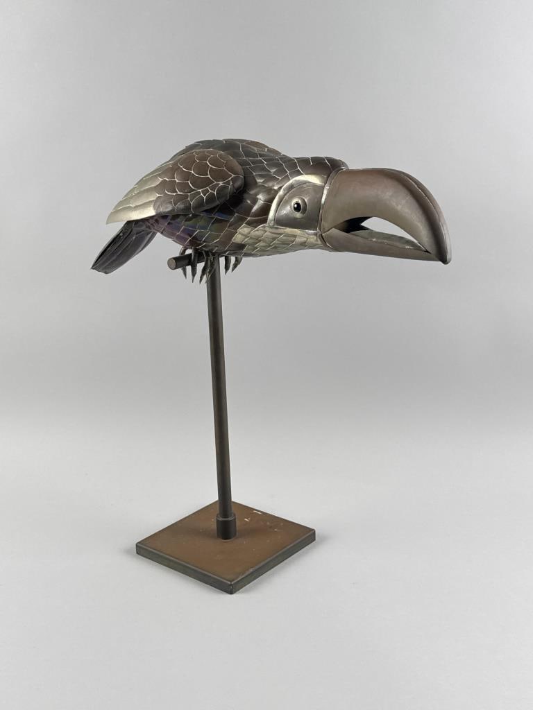 SERGIO BUSTAMANTE (New Mexico/Mexico/Holland, 1949-), Metal toucan on a perch., Height 19". (1 of 6)