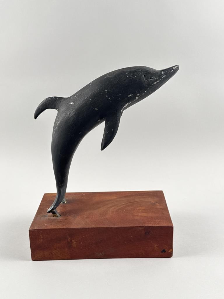 CAST METAL DOLPHIN 20th Century Height 13".: CAST METAL DOLPHIN 20th Century Mounted on a mahogany base. Height 13".