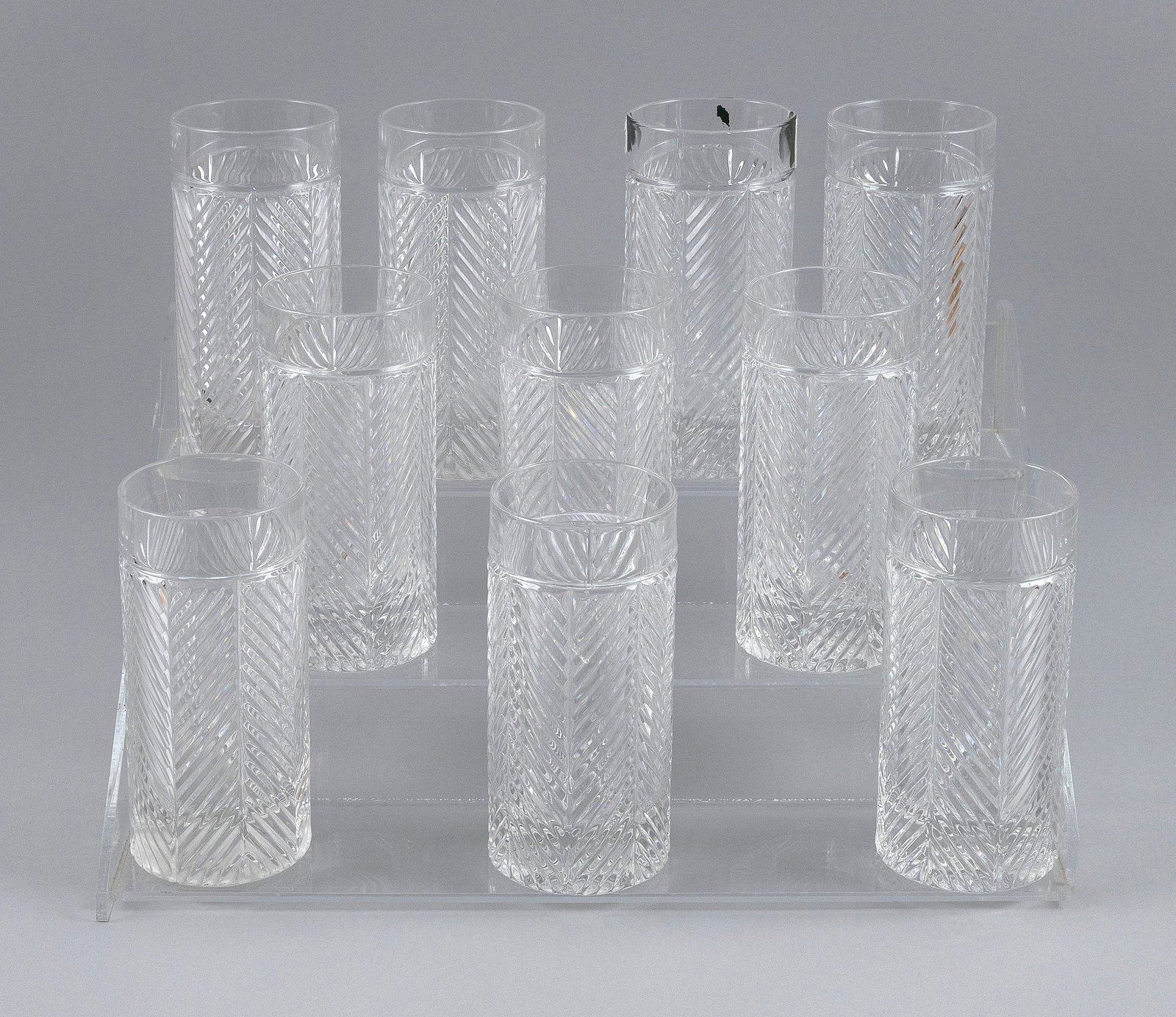 TEN RALPH LAUREN CRYSTAL HERRINGBONE-PATTERN HIGHBALL GLASSES Circa 1993-2002 Heights 6.25".: TEN RALPH LAUREN CRYSTAL HERRINGBONE-PATTERN HIGHBALL GLASSES Circa 1993-2002 Etched monogram signature on bases. Heights 6.25".