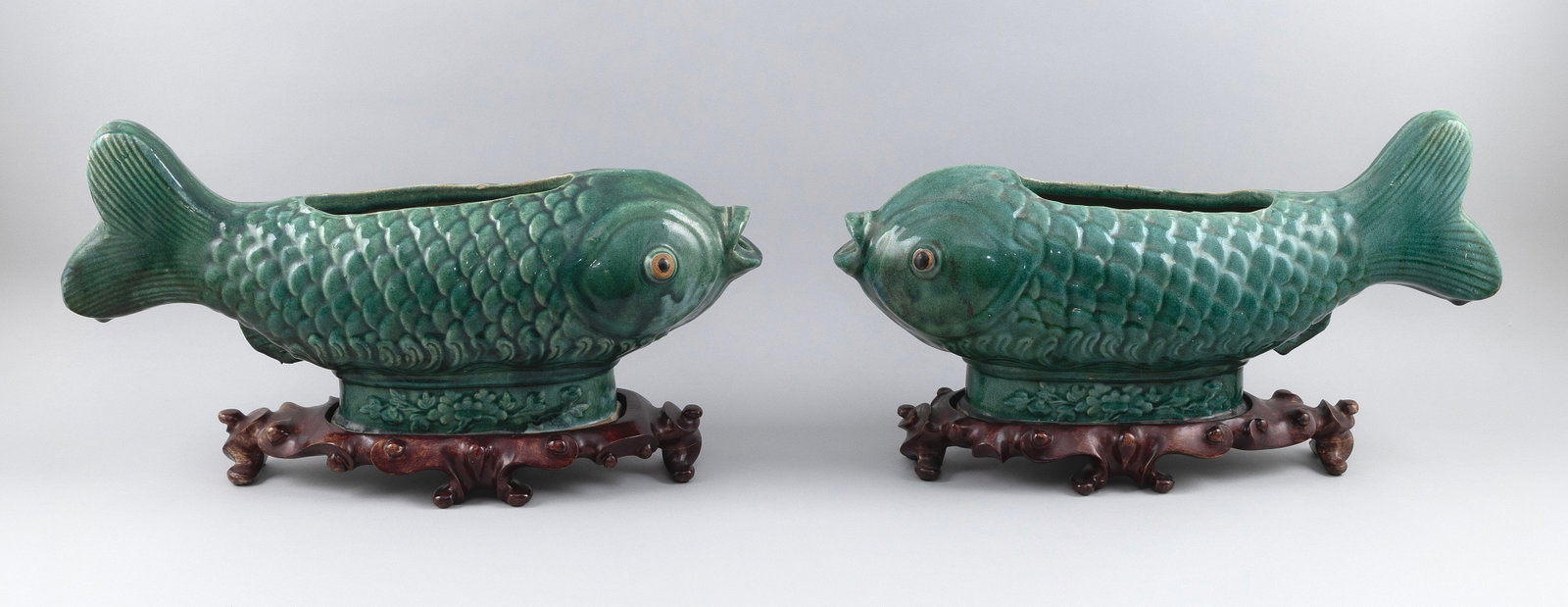 PAIR OF CHINESE GREEN GLAZE CERAMIC FISH-FORM PLANTERS Late 19th/Early 20th Century Heights 10". (1 of 6)