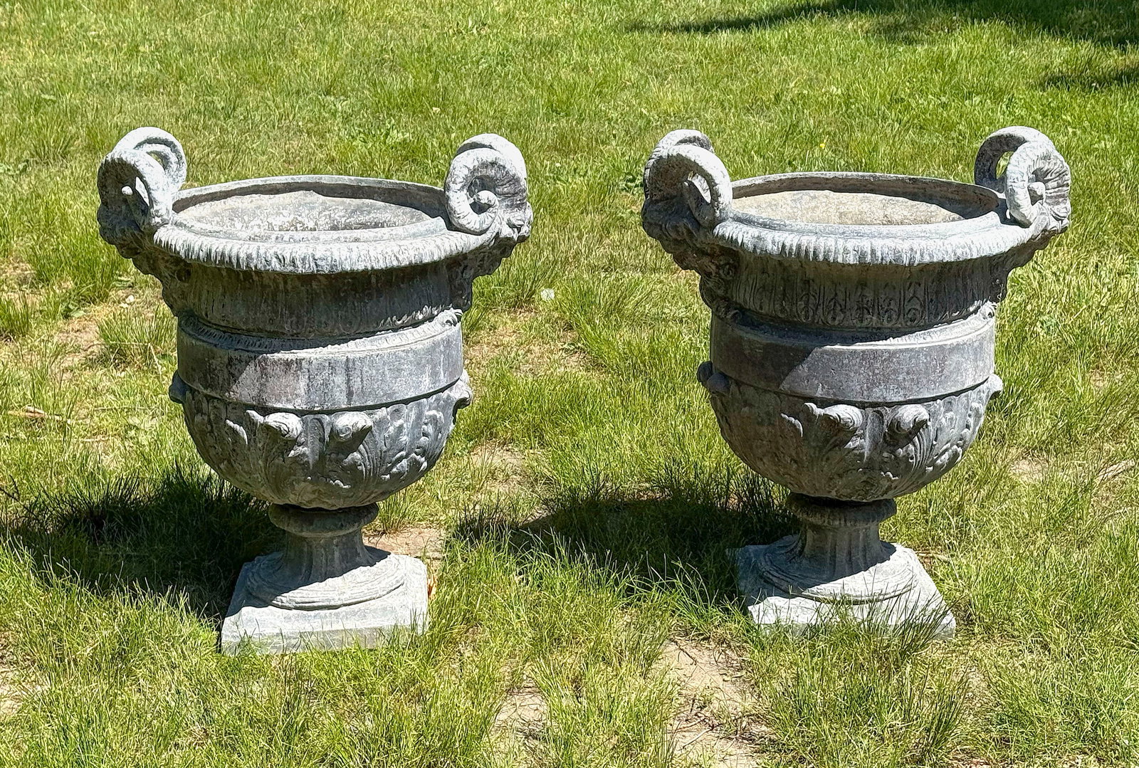PAIR OF CAST LEAD GARDEN URNS 20th Century Heights 29". Lengths 25". Widths 20". (1 of 3)
