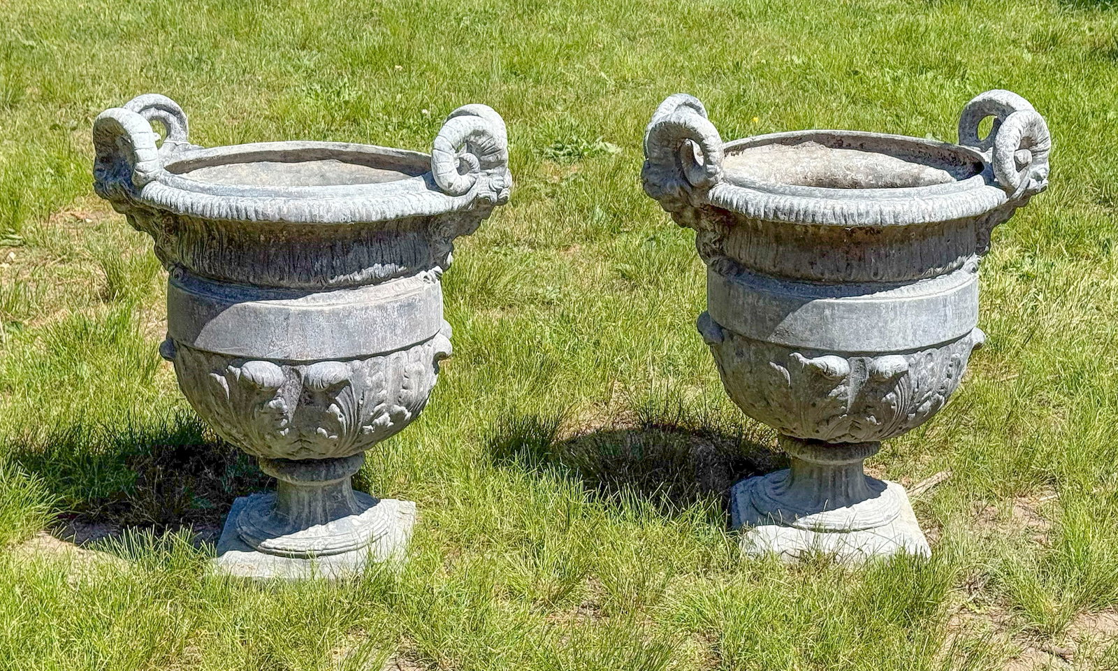 PAIR OF CAST LEAD GARDEN URNS 20th Century Heights 29". Lengths 25". Widths 20". (1 of 3)