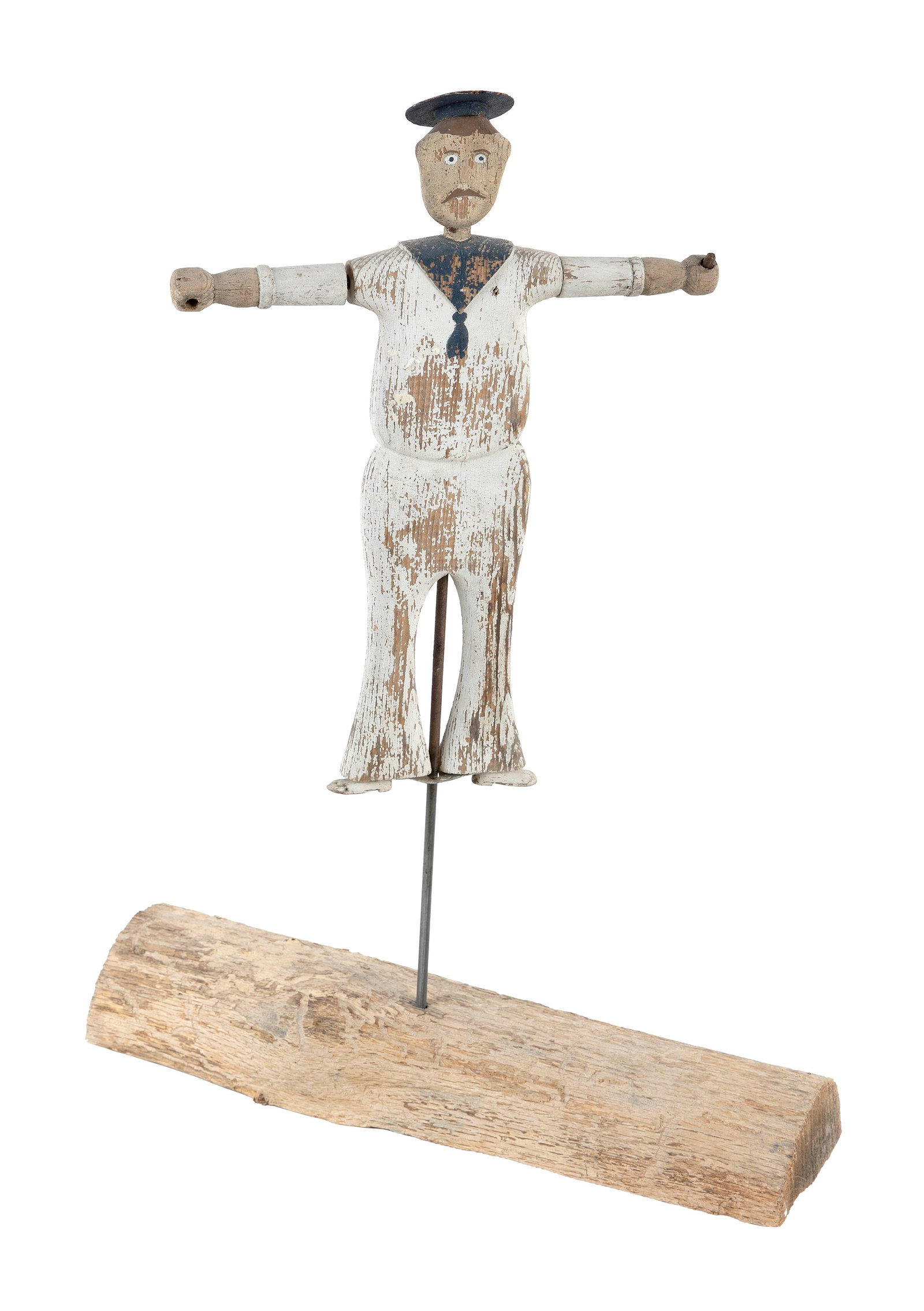 VINTAGE CARVED AND PAINTED WOODEN SAILOR WHIRLIGIG 20th Century Total height 22". Length 15.75".: VINTAGE CARVED AND PAINTED WOODEN SAILOR WHIRLIGIG 20th Century Charming crusty finish. Missing paddles. Mounted on a metal rod and driftwood base. Total height 22". Length 15.75". Provenance: Rafael 