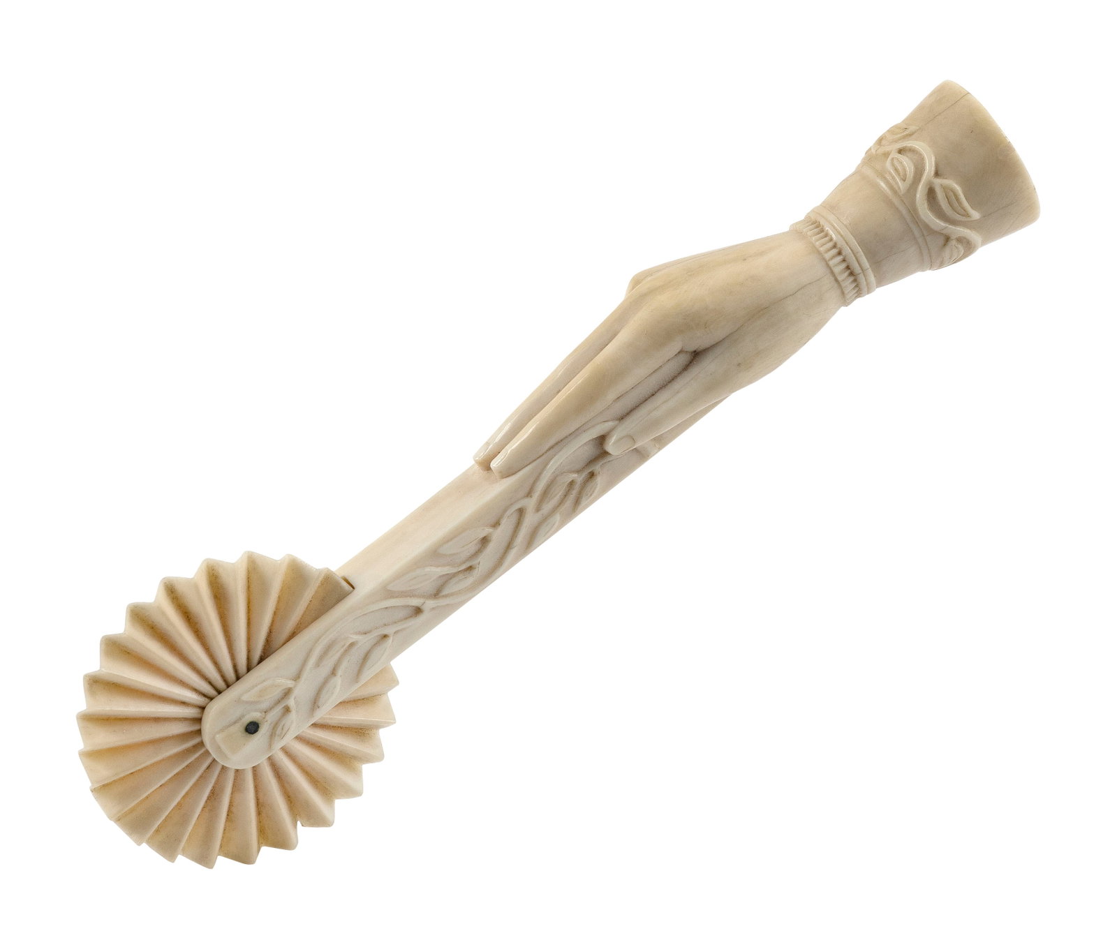 SCRIMSHAW WHALE IVORY "HAND HOLDING SHAFT" PIE CRIMPER, 19th Century Length 6".: SCRIMSHAW WHALE IVORY "HAND HOLDING SHAFT" PIE CRIMPER 19th Century Graceful and realistic hand grips the shaft between the thumb, index and middle fingers, while the remaining two fingers are curled 
