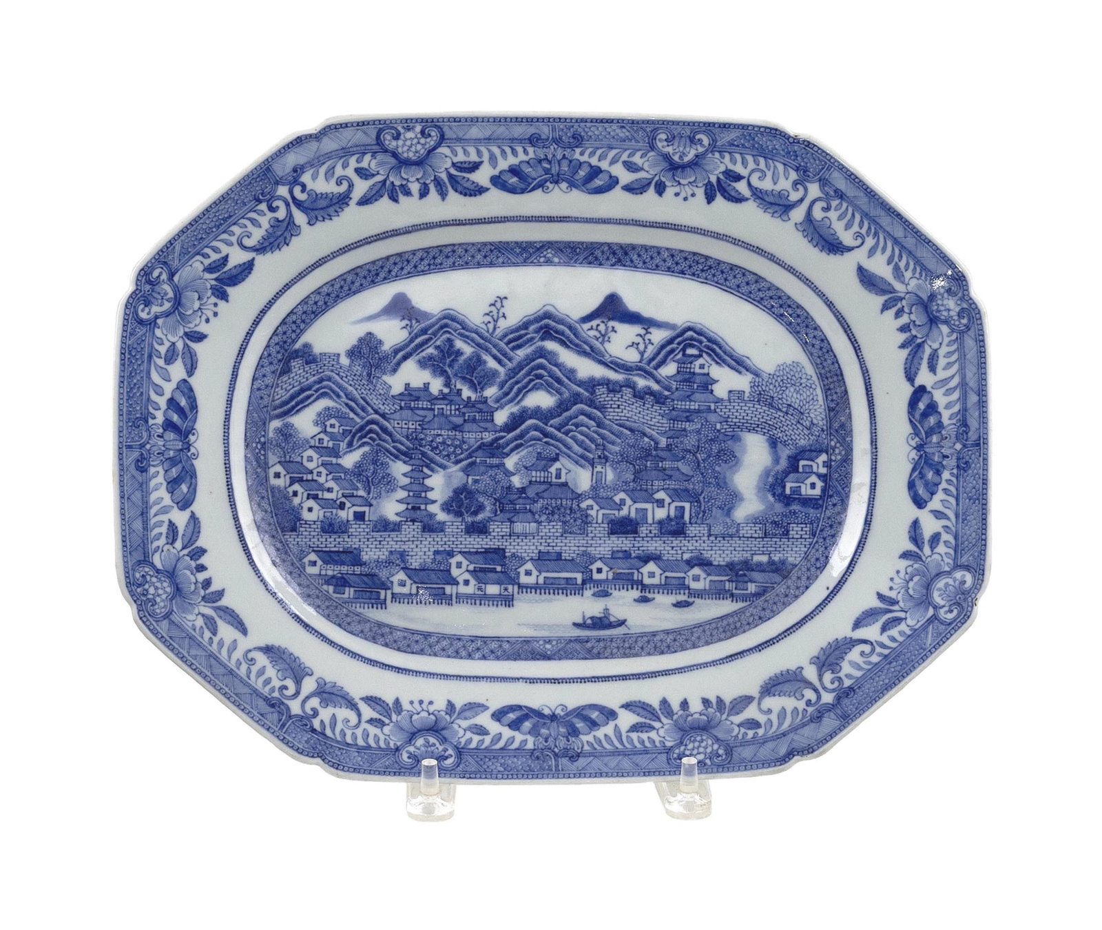 RARE CHINESE EXPORT BLUE AND WHITE PORCELAIN OCTAGONAL PLATTER WITH VIEW OF THE CANTON WATERFRONT: RARE CHINESE EXPORT BLUE AND WHITE PORCELAIN OCTAGONAL PLATTER WITH VIEW OF THE CANTON WATERFRONT Circa 1780 Length 14". Provenance: Polly Latham Asian Art, Boston, May, 31, 2000, with original sales 