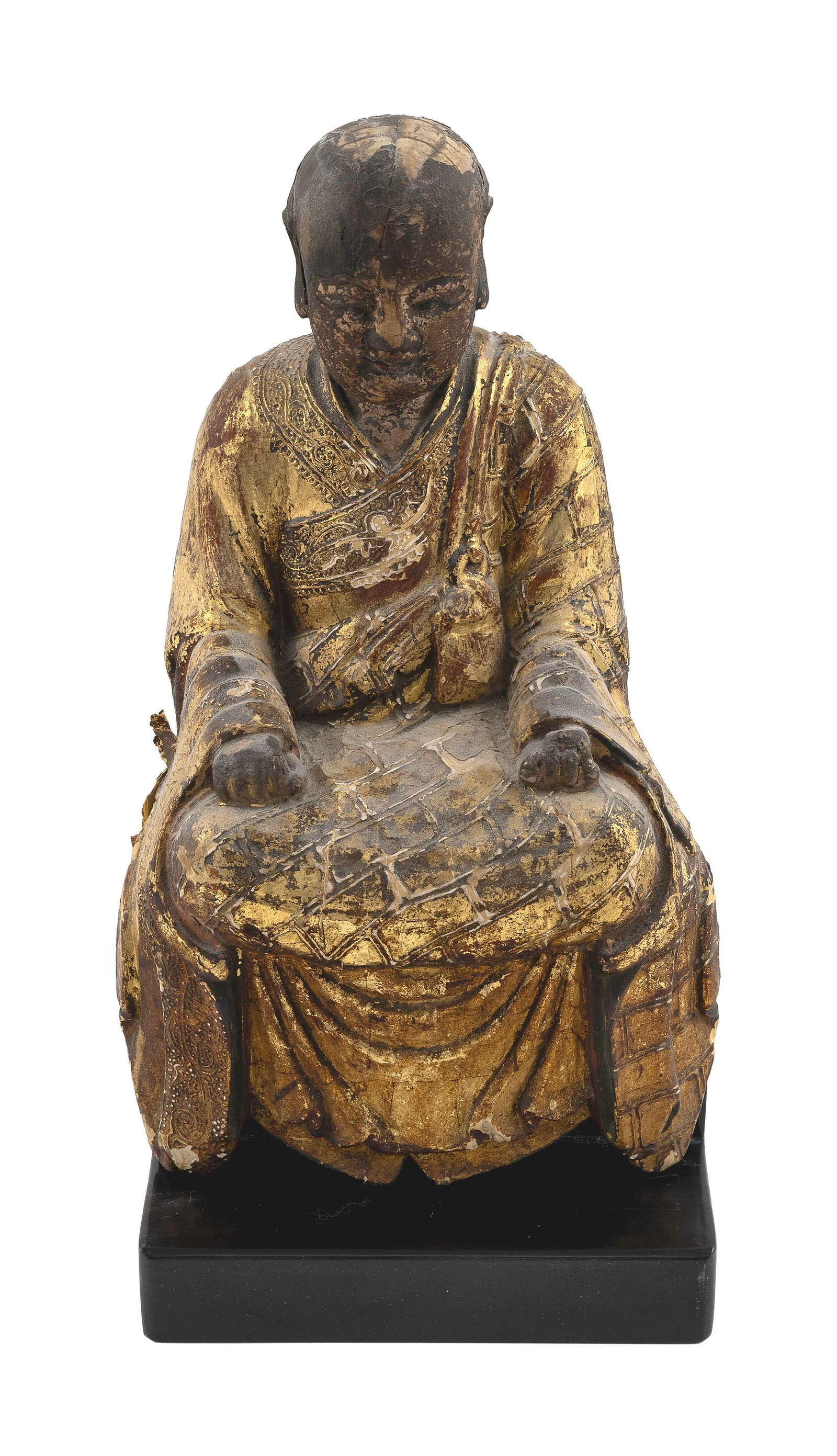 CHINESE CARVED AND RED LACQUERED GILTWOOD MONK 19th Century Height 14".: CHINESE CARVED AND RED LACQUERED GILTWOOD MONK 19th Century In gilt brocade robes, seated on a separate black-painted stand. Height 14". Provenance: The Estate of Dr. William E. Strole, Jr. of Boston.