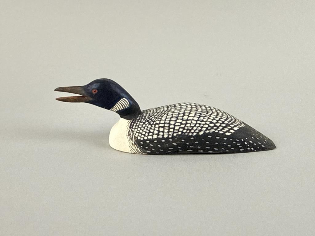 HAROLD GIBBS MINIATURE LOON CARVING Barrington, Rhode Island, 1866-1970 Length 4.5".: HAROLD GIBBS MINIATURE LOON CARVING Barrington, Rhode Island, 1866-1970 Circa 1960. In calling form with mouth open. Signed "HG" on underside. Length 4.5".