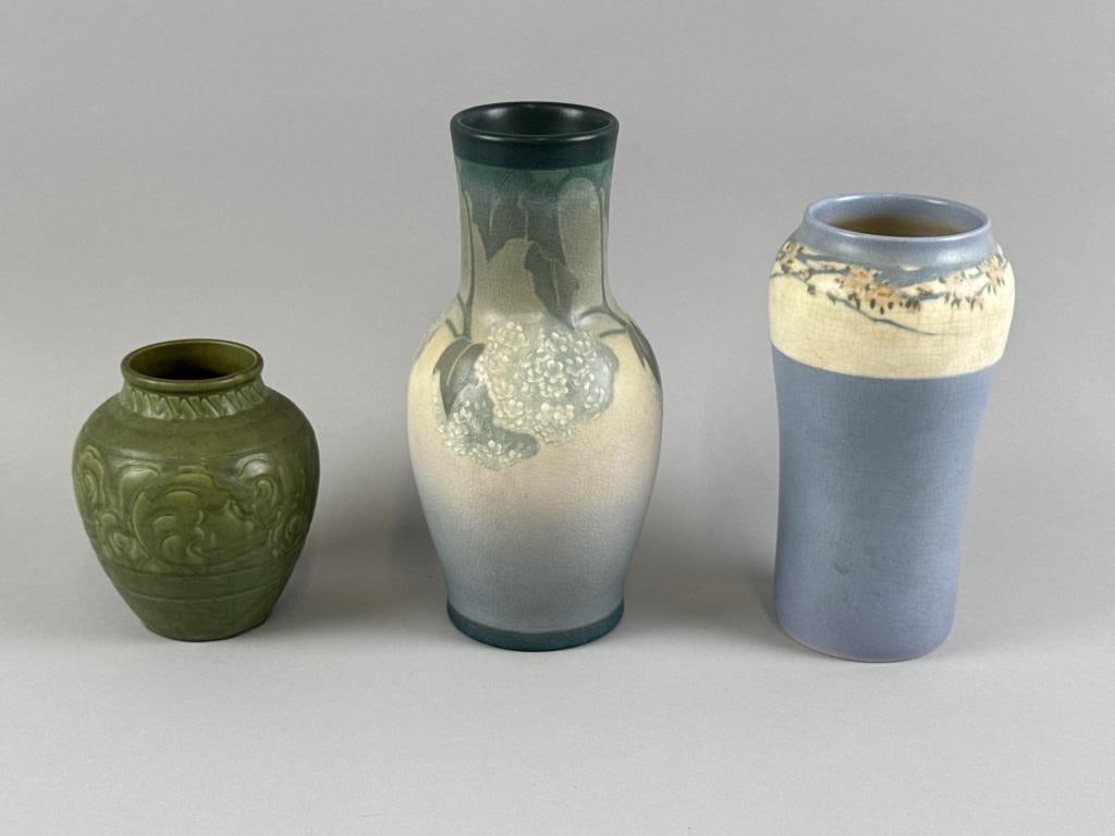 THREE PIECES OF ROOKWOOD POTTERY Cincinnati, Late 19th Century: THREE PIECES OF ROOKWOOD POTTERY Cincinnati, Late 19th Century All with maker's mark on undersides. 1) Sarah Sax for Rookwood vellum vase with hydrangea decoration. Initialed on underside. Height 10".
