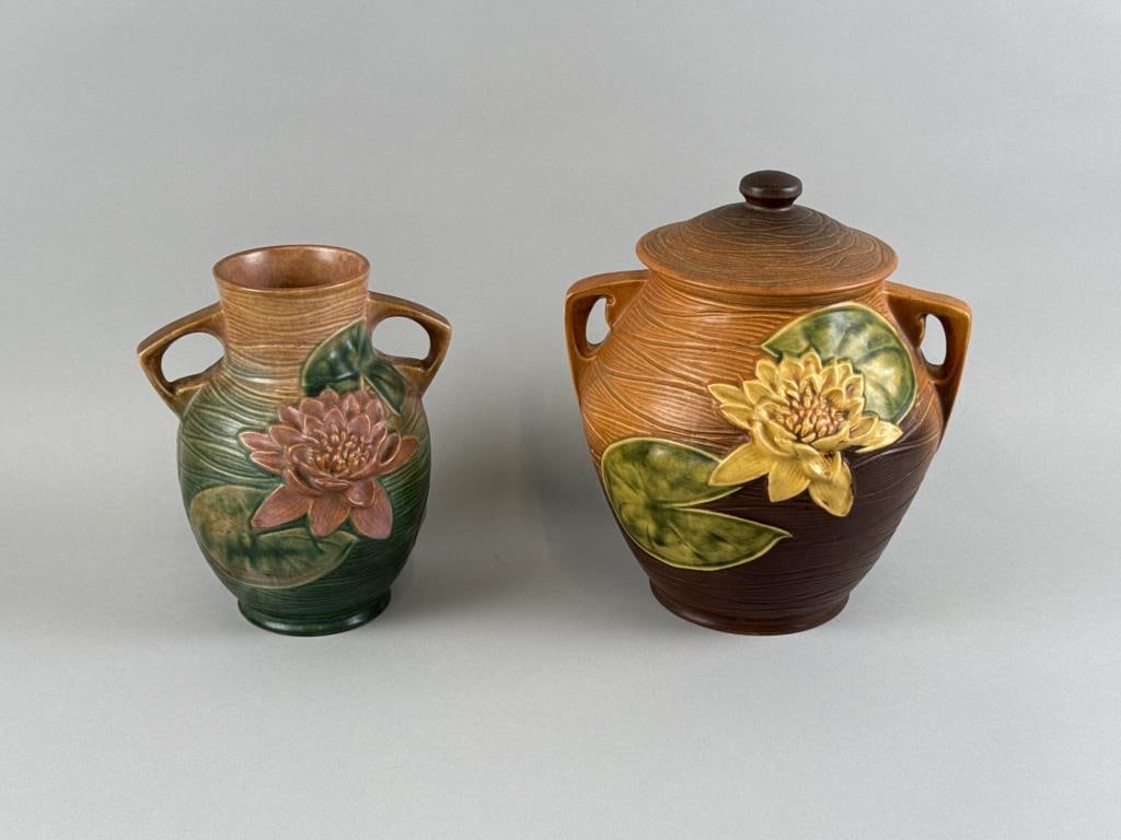 TWO PIECES OF ROSEVILLE POTTERY Ohio, 19th Century: TWO PIECES OF ROSEVILLE POTTERY Ohio, 19th Century 1) Double-handled vase with waterlily decoration. Height 8.25". Width 7". 2) Double-handled covered cookie jar with waterlily decoration. Height 10.2