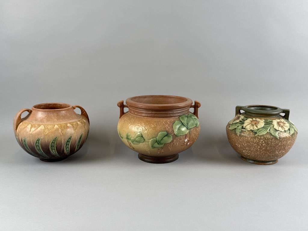 THREE PIECES OF ROSEVILLE POTTERY Ohio, 19th Century: THREE PIECES OF ROSEVILLE POTTERY Ohio, 19th Century 1) Squat double-handled vase with daisy decoration around shoulder. Height 6". Diameter 7.5". 2) Double-handled jardiniere with fuchsia decoration.
