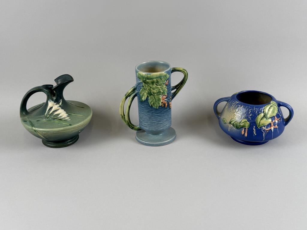 THREE PIECES OF ROSEVILLE POTTERY Ohio, Late 19th Century: THREE PIECES OF ROSEVILLE POTTERY Ohio, Late 19th Century 1) Squat pitcher with freesia decoration. Height 6.5". Length 6". 2) Squat double-handled vase with fuchsia decoration. Height 4.25". 3) Foote