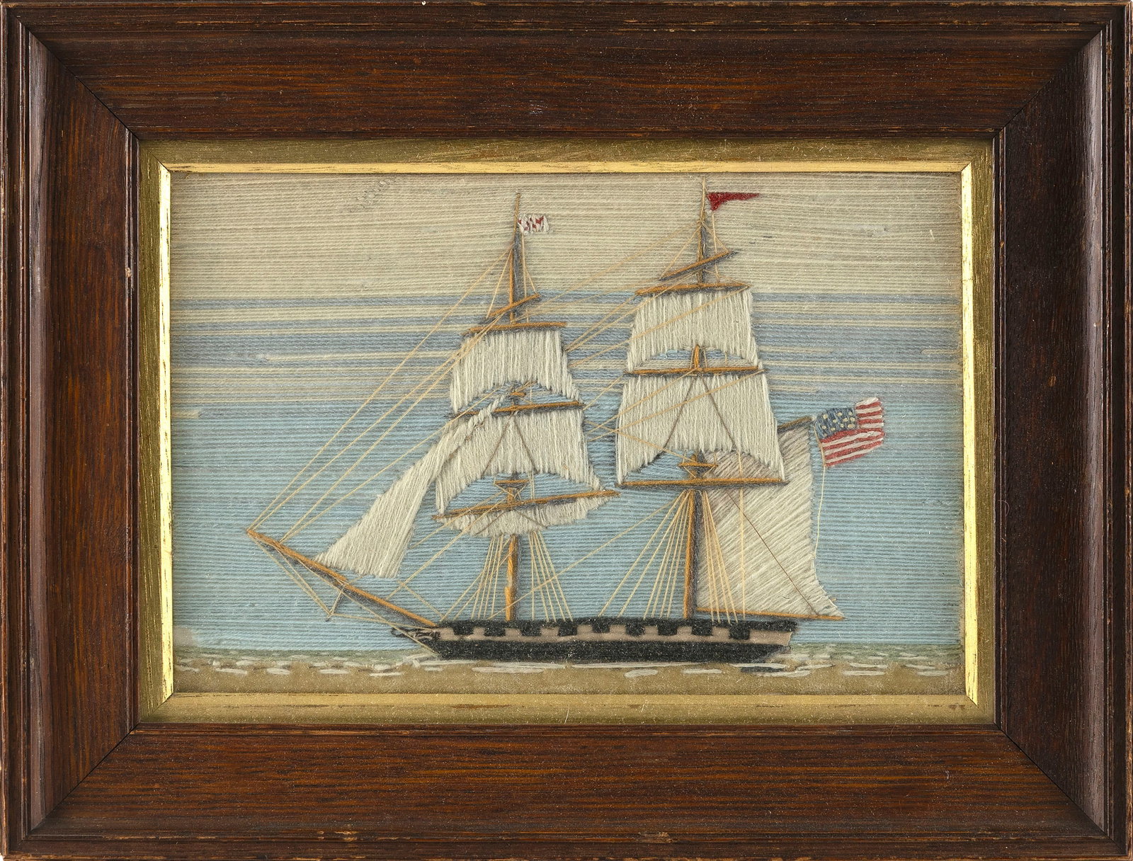 ENGLISH WOOLWORK DEPICTING A TWO-MASTED AMERICAN SHIP 19th Century 7.5" x 11" sight. Framed 12.5" x (1 of 1)