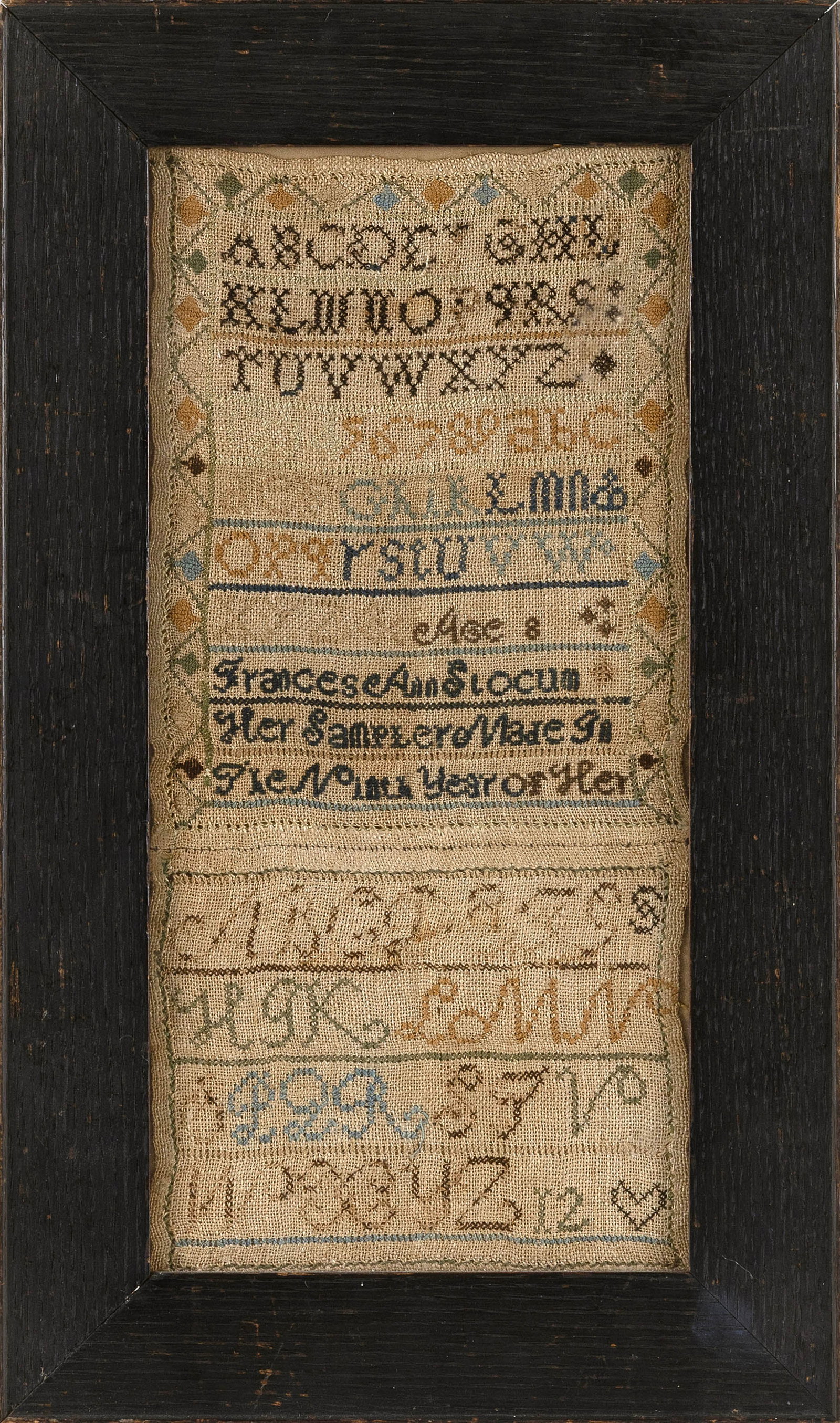 AMERICAN NEEDLEWORK SAMPLER, PROBABLY RHODE ISLAND 19th Century 15" x 7" sight. Framed 19" x 11".: AMERICAN NEEDLEWORK SAMPLER, PROBABLY RHODE ISLAND 19th Century Wrought by Frances Ann Slocum. In two sections. Upper piece with geometric border surrounding alphabets and numerals above "Age 8 France
