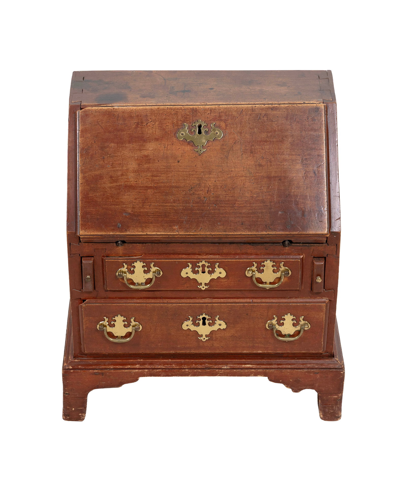 CHILD'S CHIPPENDALE MAPLE SLANT-LID DESK Last Half of the 18th Century Height 18". Width 15.25".: CHILD'S CHIPPENDALE MAPLE SLANT-LID DESK Last Half of the 18th Century Under an old, possibly the original red stain. Slant lid attached with snipe hinges and encloses pigeonholes and drawers. Case wi