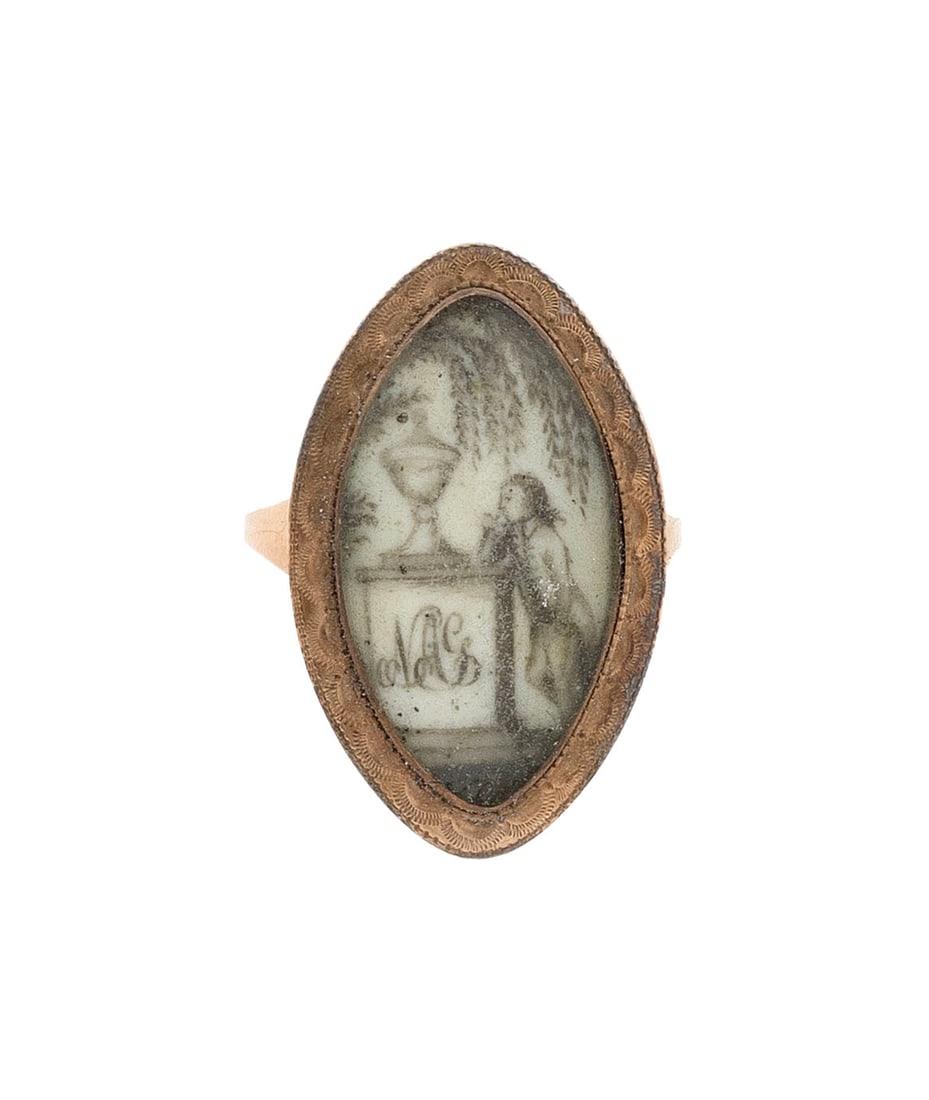 GILMAN FAMILY MOURNING RING 18th Century Length 1".: GILMAN FAMILY MOURNING RING 18th Century Miniature mourning painting on ivory behind glass in a 14kt gold setting. Painting depicts a figure resting against an urn-topped monument with a script monogr