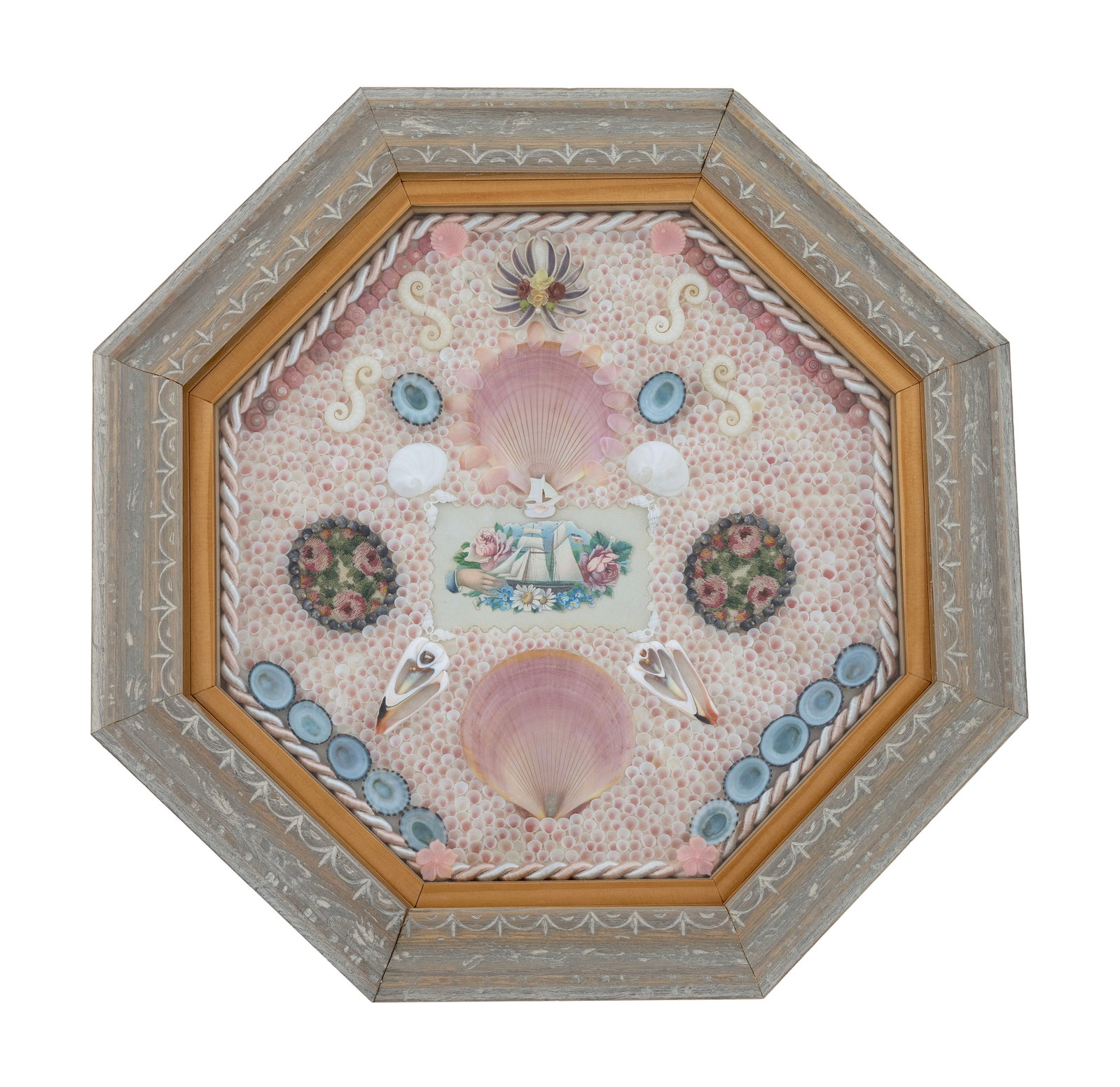 LYNDA SUSAN HENNIGAN SAILOR'S VALENTINE Connecticut, 1951-2025 Frame width 16.25".: LYNDA SUSAN HENNIGAN SAILOR'S VALENTINE Connecticut, 1951-2025 Composed of multicolored shells in a symmetrical pattern around a rectangular medallion depicting a ship and flowers. Housed in an octago