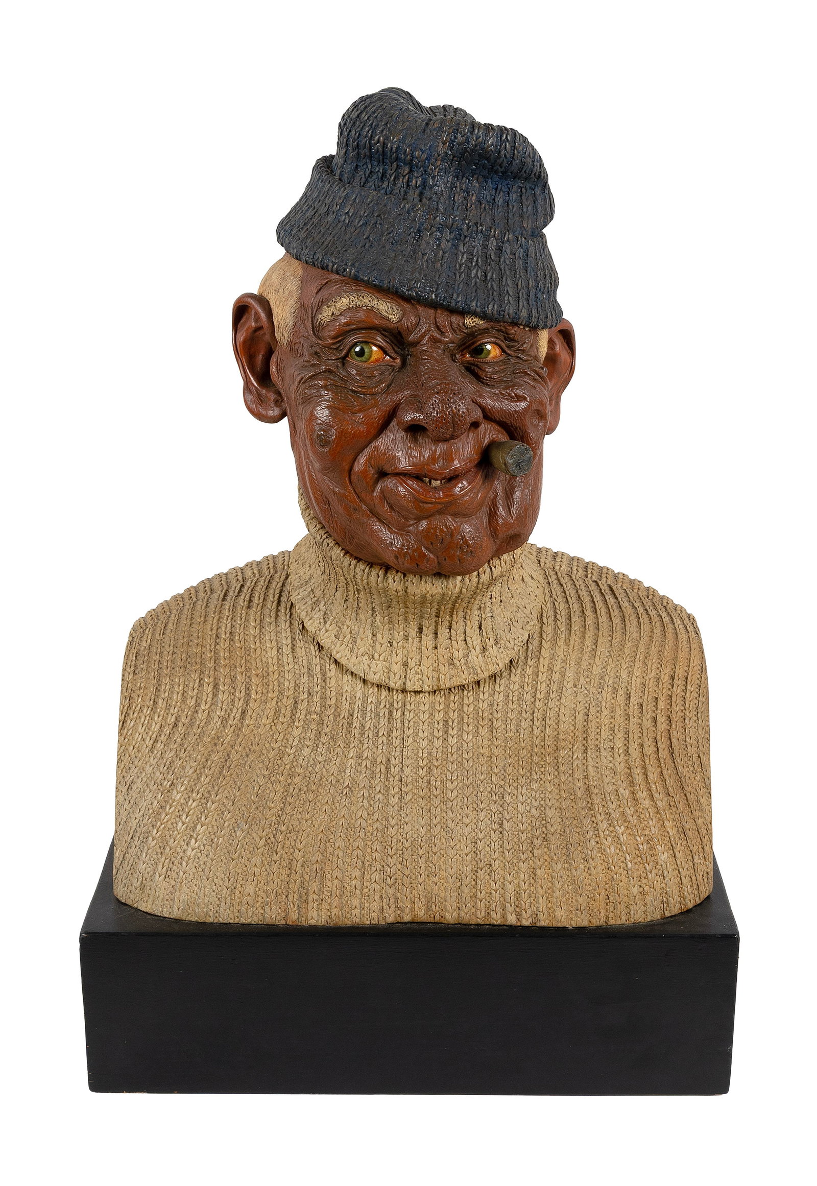 ARMAND LAMONTAGNE (Rhode Island, 1939-2025), "Seaman"., Height 25". Width 17". Depth 11.5".: ARMAND LAMONTAGNE Rhode Island, 1939-2025 "Seaman". Carved wooden bust of a man smoking a cigar. Mounted on a wood box. Signed, titled and dated "Seaman Armand LaMontagne 1977 N. Scituate, RI". Height