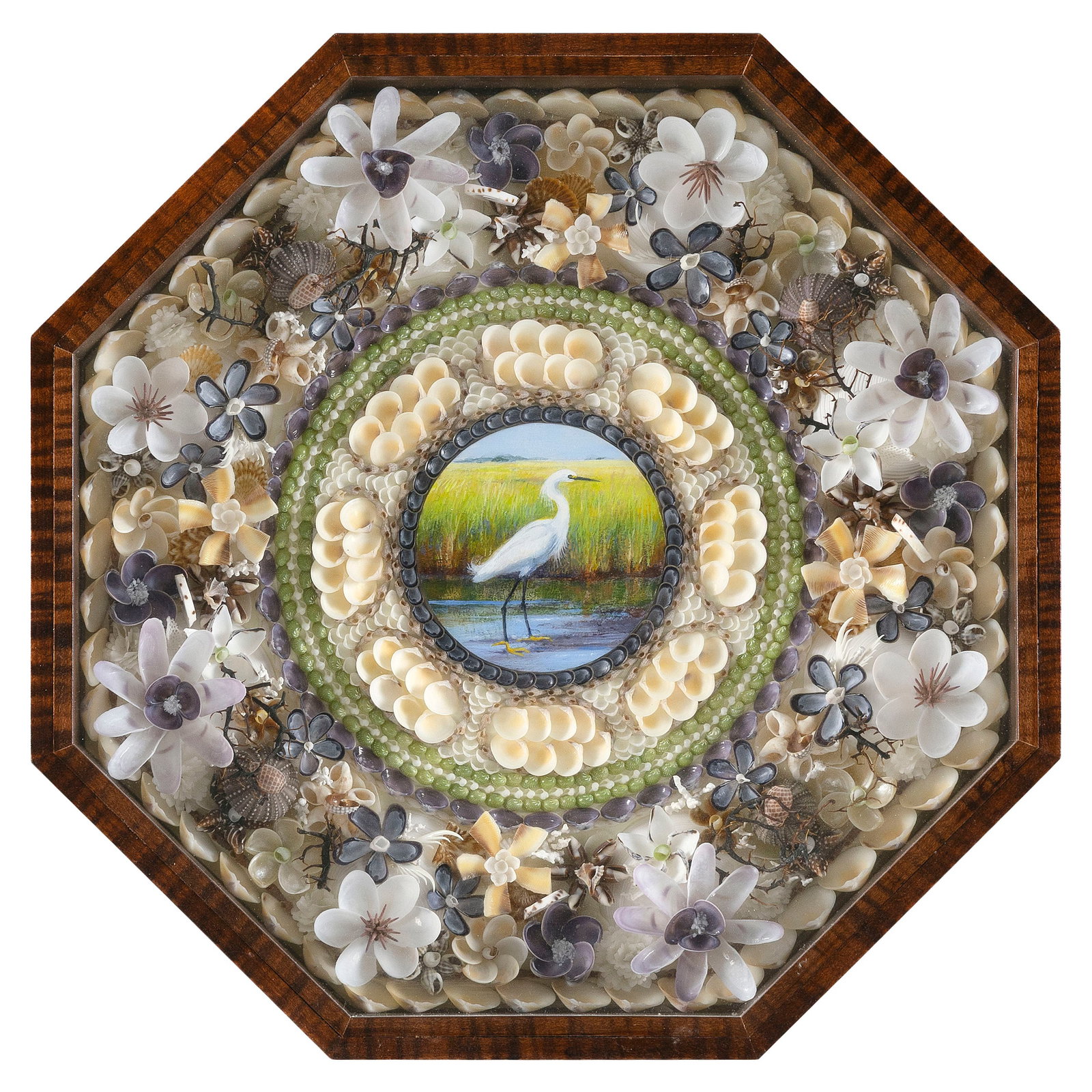 SANDY MORAN (Massachusetts, 1944-2020), "Bird's Eye View", a sailor's valentine composed of: SANDY MORAN Massachusetts, 1944-2020 "Bird's Eye View", a sailor's valentine composed of multicolored shells surrounding a medallion depicting a heron in a marsh. Housed in an octagonal tiger maple ca