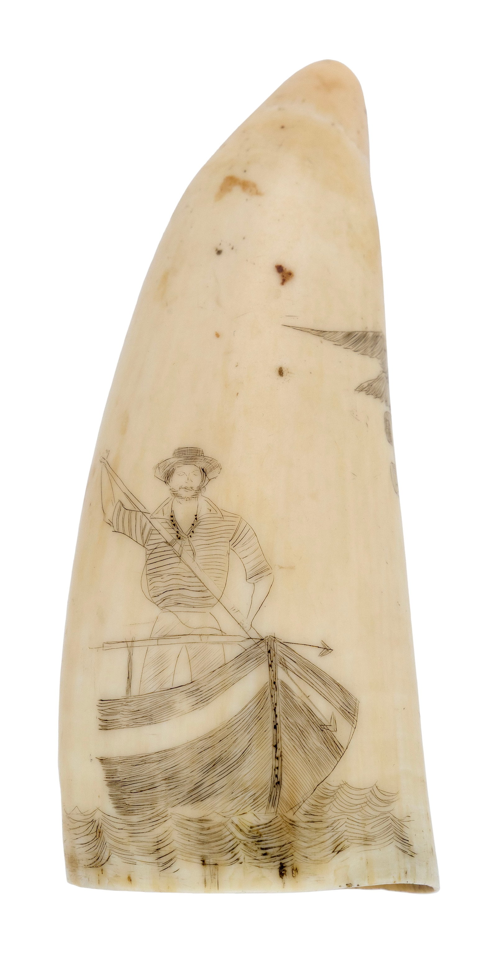 SCRIMSHAW WHALE'S TOOTH DEPICTING A WHALEMAN 19th Century Length 4.75".: SCRIMSHAW WHALE'S TOOTH DEPICTING A WHALEMAN 19th Century Obverse depicts a harpooner at the bow of a whaleboat. Reverse depicts a three-masted vessel. One edge with an eagle grasping a document in it