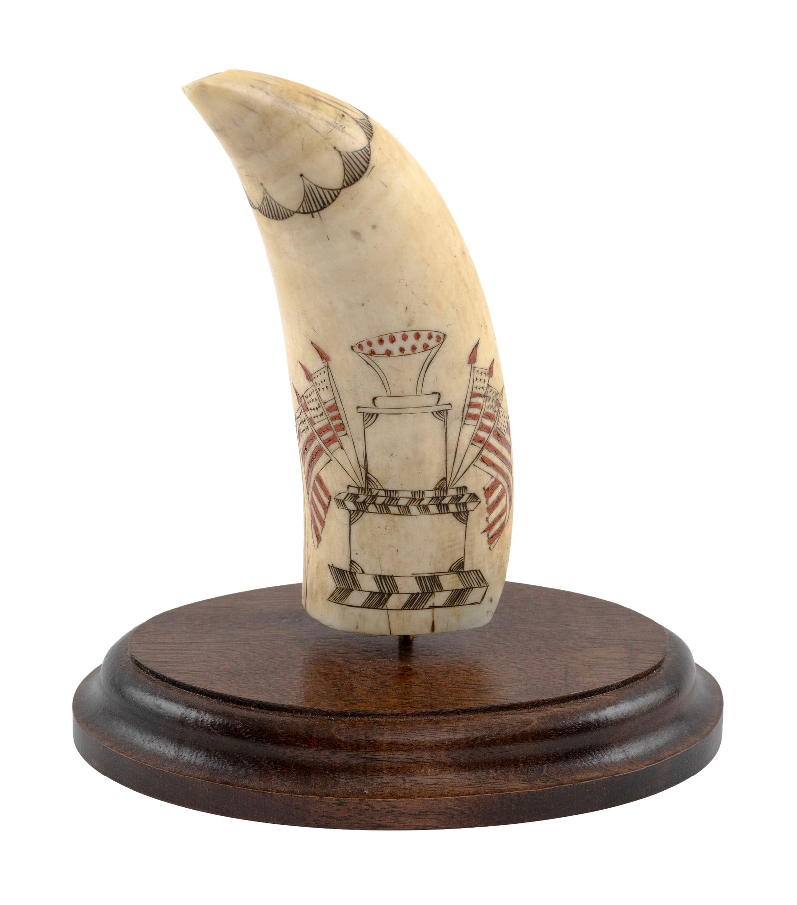 POLYCHROME SCRIMSHAW WHALE'S TOOTH WITH PATRIOTIC MONUMENT America, Circa 1845 Length 5.25". On wood (1 of 2)