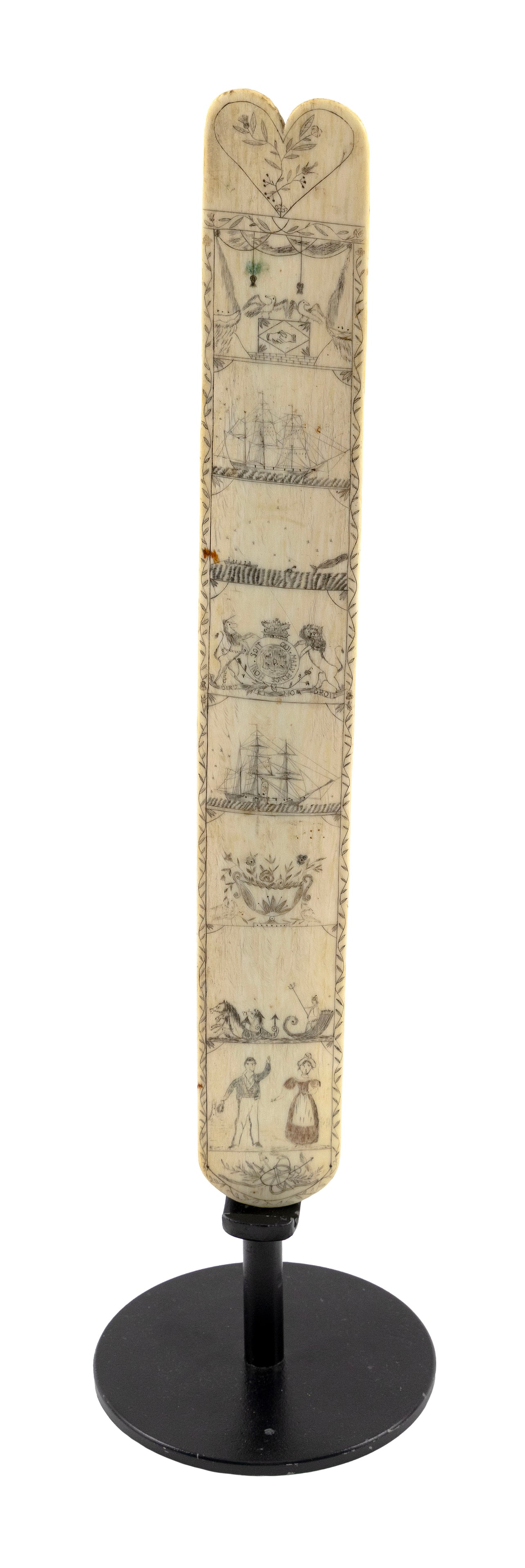 POLYCHROME SCRIMSHAW WHALEBONE BUSK 19th Century Length 13.75". With custom-made stand.: POLYCHROME SCRIMSHAW WHALEBONE BUSK 19th Century Lobed top with a heart containing a flower blossom. Eight vignettes below depict two birds atop a clasped hands monument; a whaling scene; three-masted
