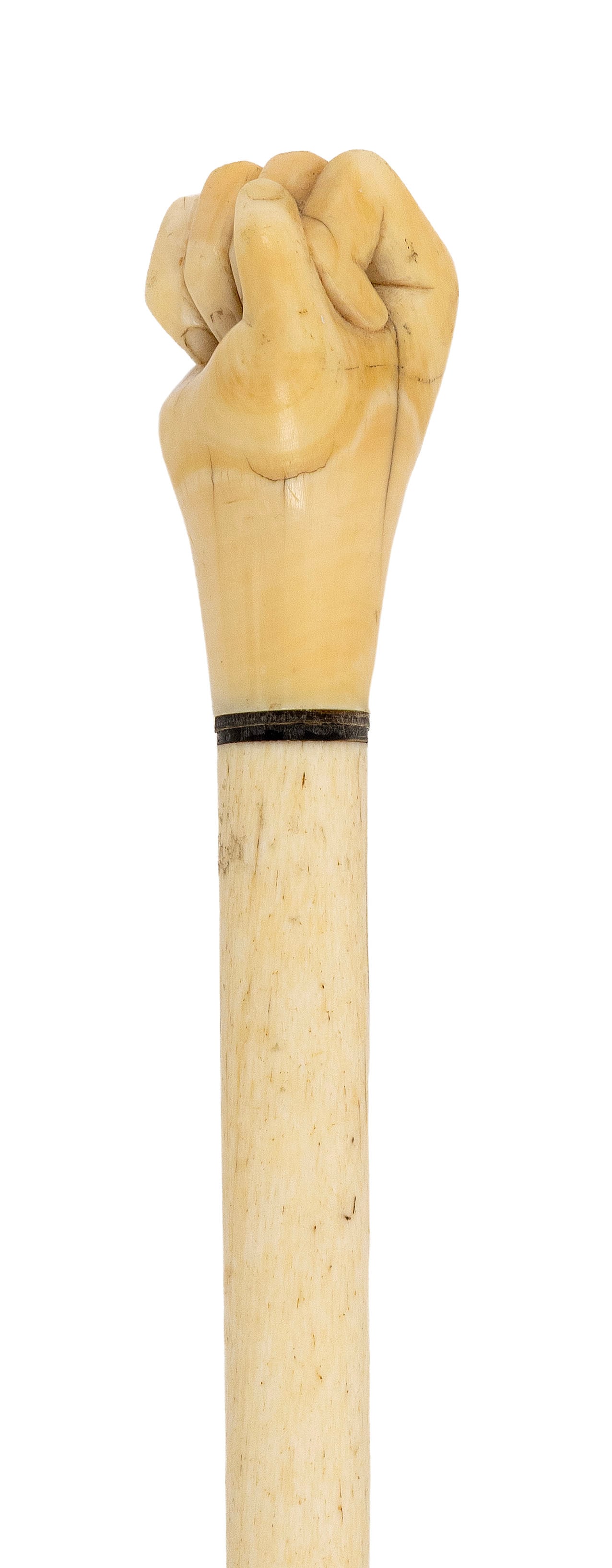 CLENCHED FIST CANE 19th Century Length 33.5".: CLENCHED FIST CANE 19th Century Whale ivory handle carved as a clenched right fist. Baleen collar. Whalebone shaft. Length 33.5".
