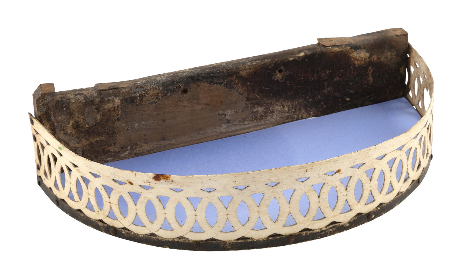 RARE WHALEMAN-MADE DEMILUNE SHELF 19th Century Height 3.75". Width 14.25". Depth 7.25".: RARE WHALEMAN-MADE DEMILUNE SHELF 19th Century Carved and pierced whalebone gallery in an interlocking ring pattern. Wood backboard and base. Height 3.75". Width 14.25". Depth 7.25". Provenance: Howla