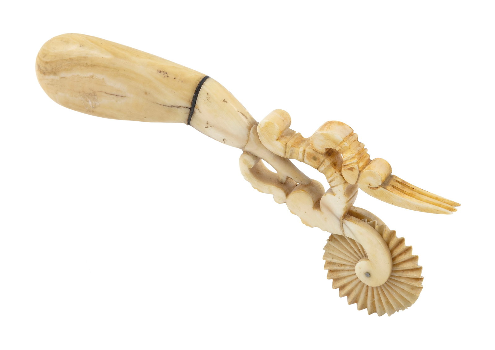 "NAUGHTY NELLIE" WHALE IVORY AND BALEEN PIE CRIMPER America, Mid-19th Century Length 7.25". (1 of 2)