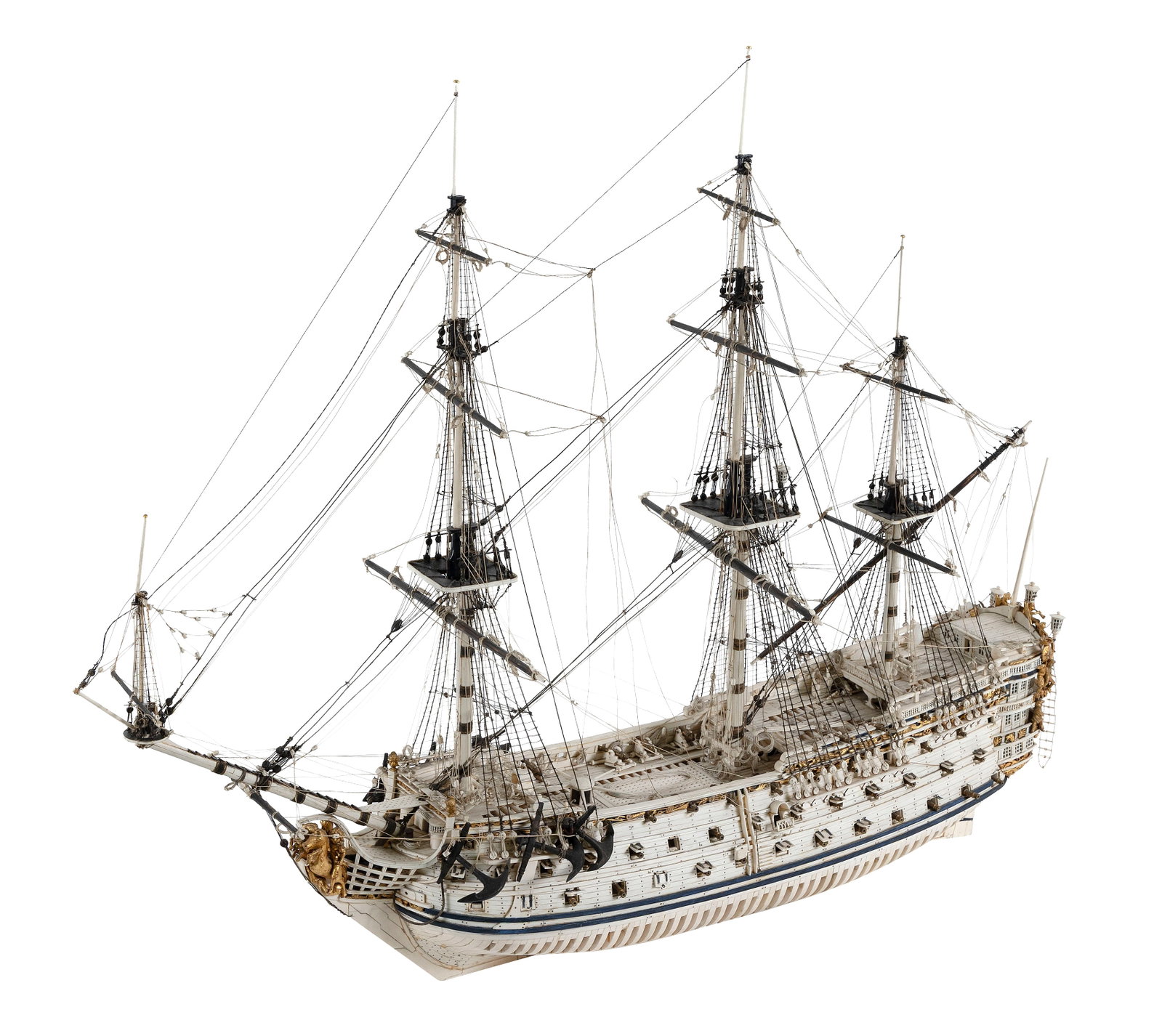 BONE AND WOOD MODEL OF THE H.M.S. "VICTORY" IN THE STYLE OF PRISONER-OF-WAR MODELS Early 20th: BONE AND WOOD MODEL OF THE H.M.S. "VICTORY" IN THE STYLE OF PRISONER-OF-WAR MODELS Early 20th Century Constructed of bone and wood. Three decks of gunports fitted with guns and lids. Exquisitely carve