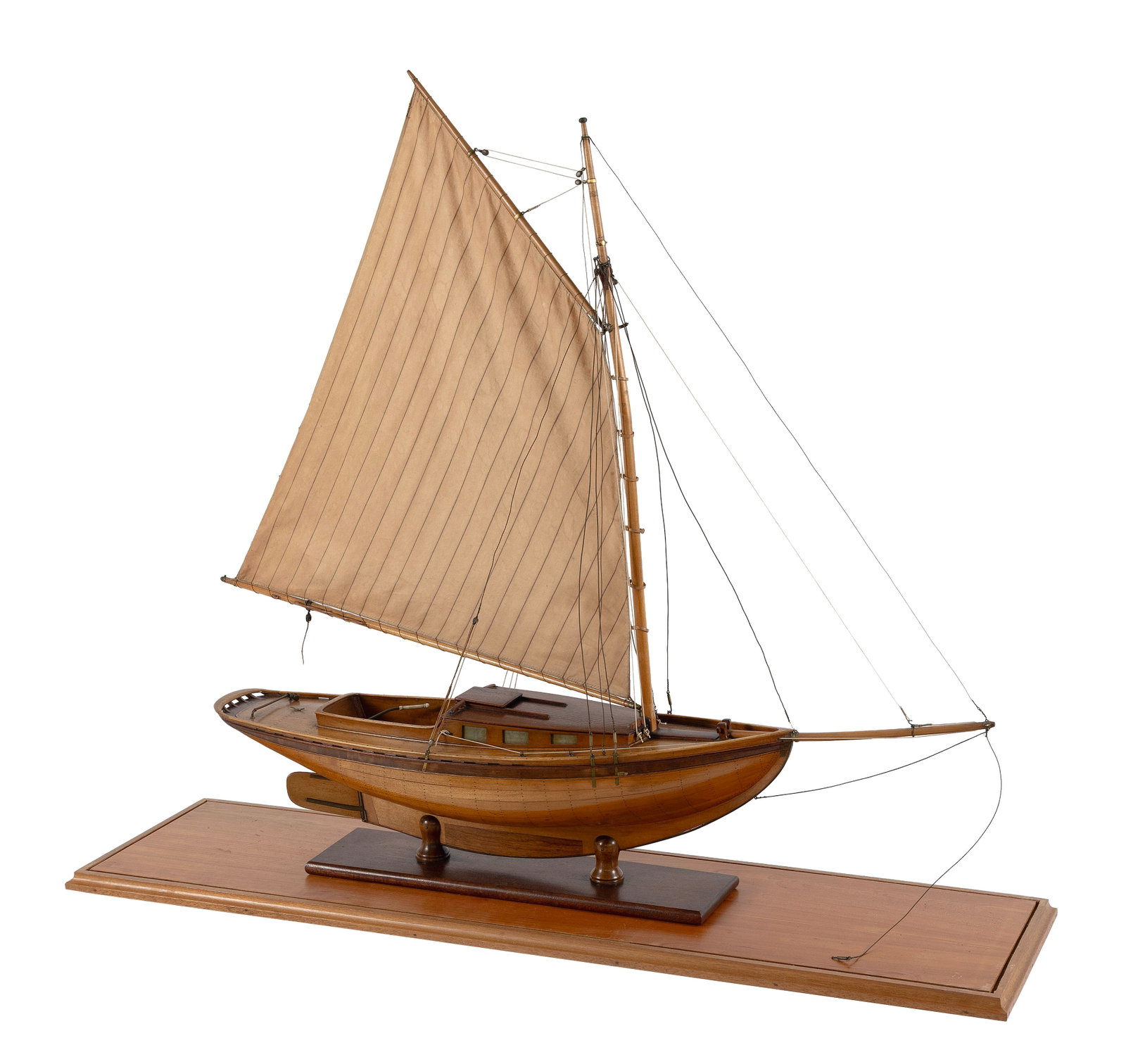 CASED MODEL OF A HERRESHOFF SLOOP Early 20th Century Model height 32". Length 33". Width 6". Case: CASED MODEL OF A HERRESHOFF SLOOP Early 20th Century Plank-on-frame construction. Displayed on a cradle within a glass and wood case. Model height 32". Length 33". Width 6". Case height 35.5". Length 