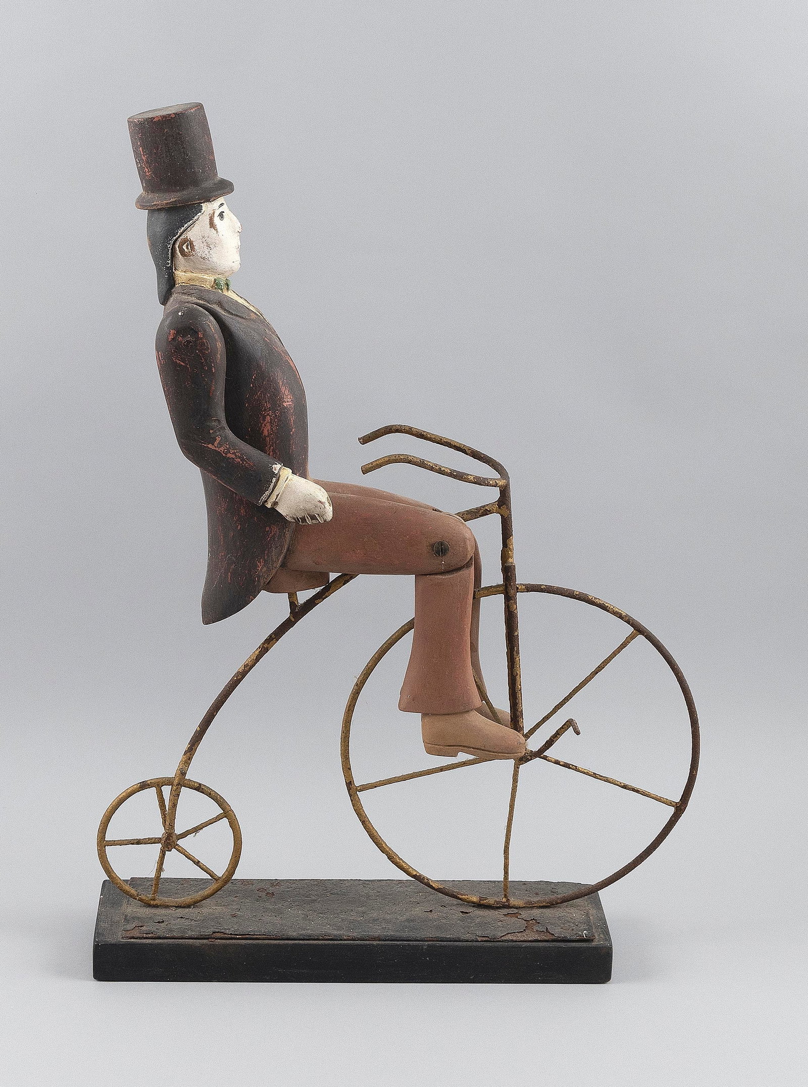 WHIMSICAL FOLK ART SCULPTURE OF A GENTLEMAN RIDING A PENNY-FARTHING BICYCLE Late 19th Century Height (1 of 4)
