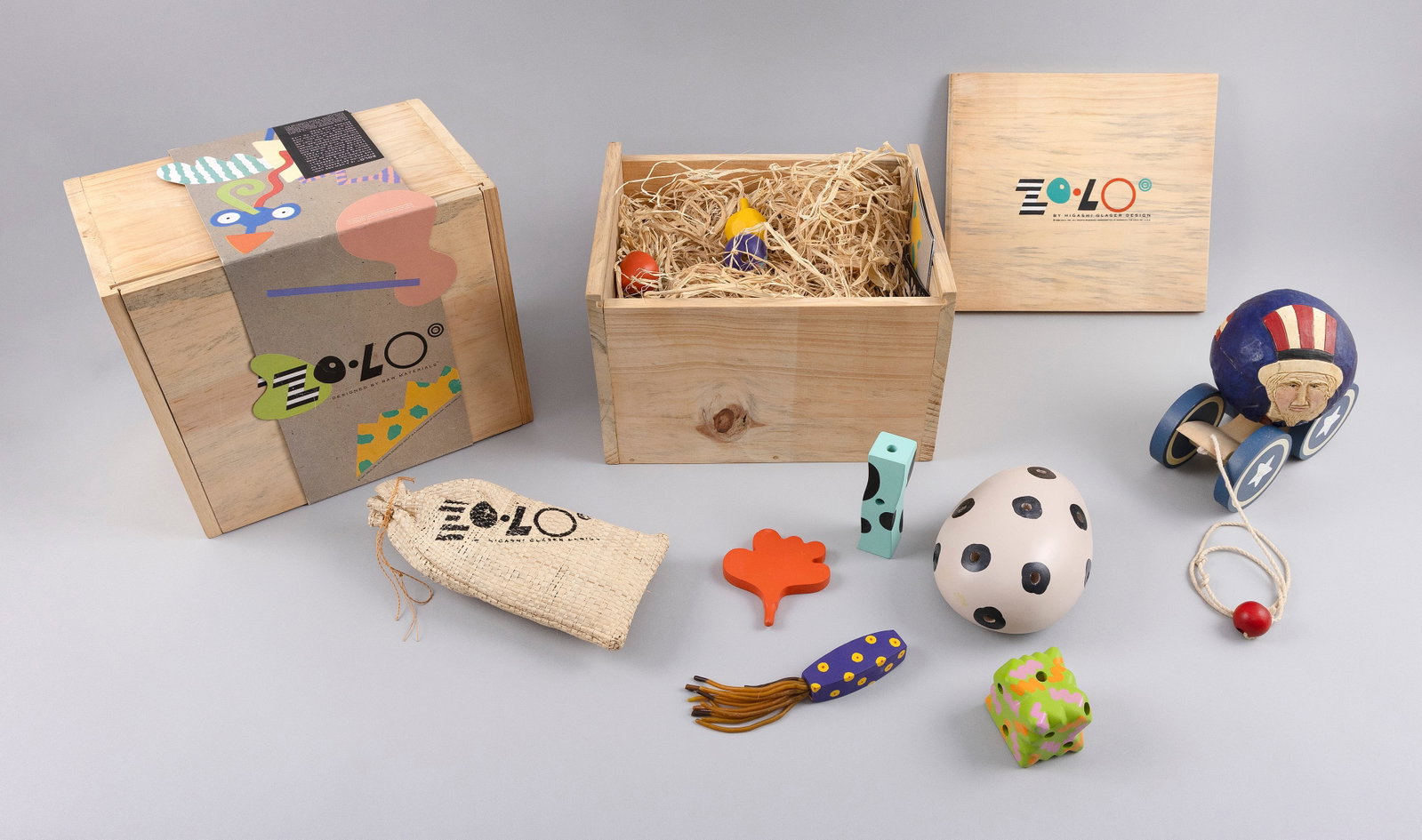 TWO ZOLO BOXED TOY SETS AND A BRIERE PULL TOY Contemporary Zolo boxes 9" x 7" x 10.5". Pull toy (1 of 4)