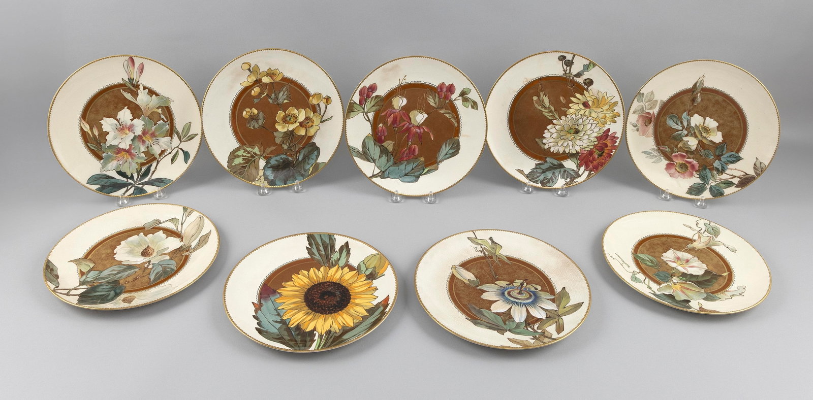SET OF NINE BRITISH CERAMIC PLATES WITH FLORAL DECORATION Mid-19th Century Diameters 9.25". (1 of 2)