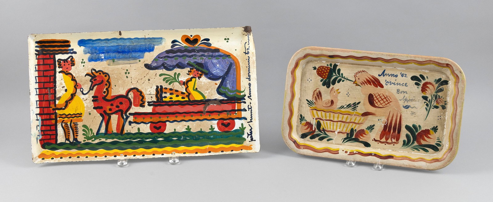 PETER HUNT (Massachusetts, 1896-1967), Two tin serving trays, Lengths 14" and 18".: PETER HUNT Massachusetts, 1896-1967 Two tin serving trays with painted figural and bird decoration. Lengths 14" and 18".