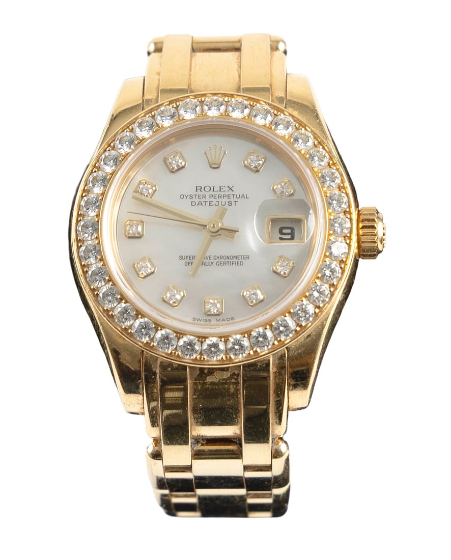 ROLEX PEARLMASTER 18KT YELLOW GOLD AND DIAMOND WATCH Circa 2005 Approx. 66.0 total dwt.: ROLEX PEARLMASTER 18KT YELLOW GOLD AND DIAMOND WATCH Circa 2005 Serial #D802597. Mother-of-pearl dial with diamond markers and date window. Bezel with 32 round-cut diamonds. Stamped. Folding clasp. Le