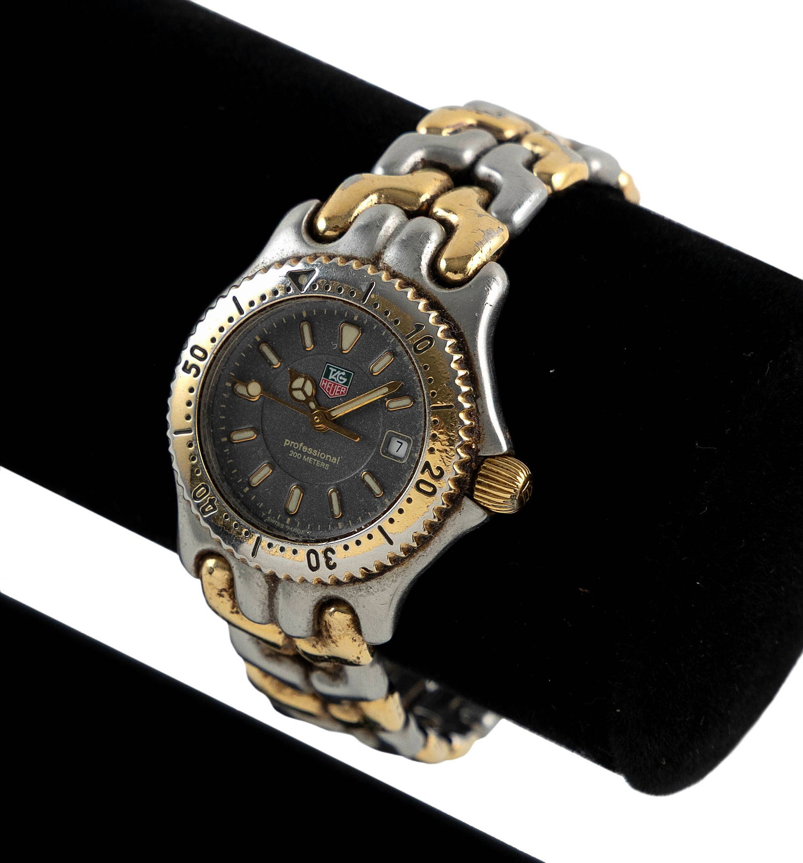 TAG HEUER PROFESSIONAL TWO-TONE WOMEN'S WATCH: TAG HEUER PROFESSIONAL TWO-TONE WOMEN'S WATCH WG-1320-0. Gray dial with date. Quartz movement.