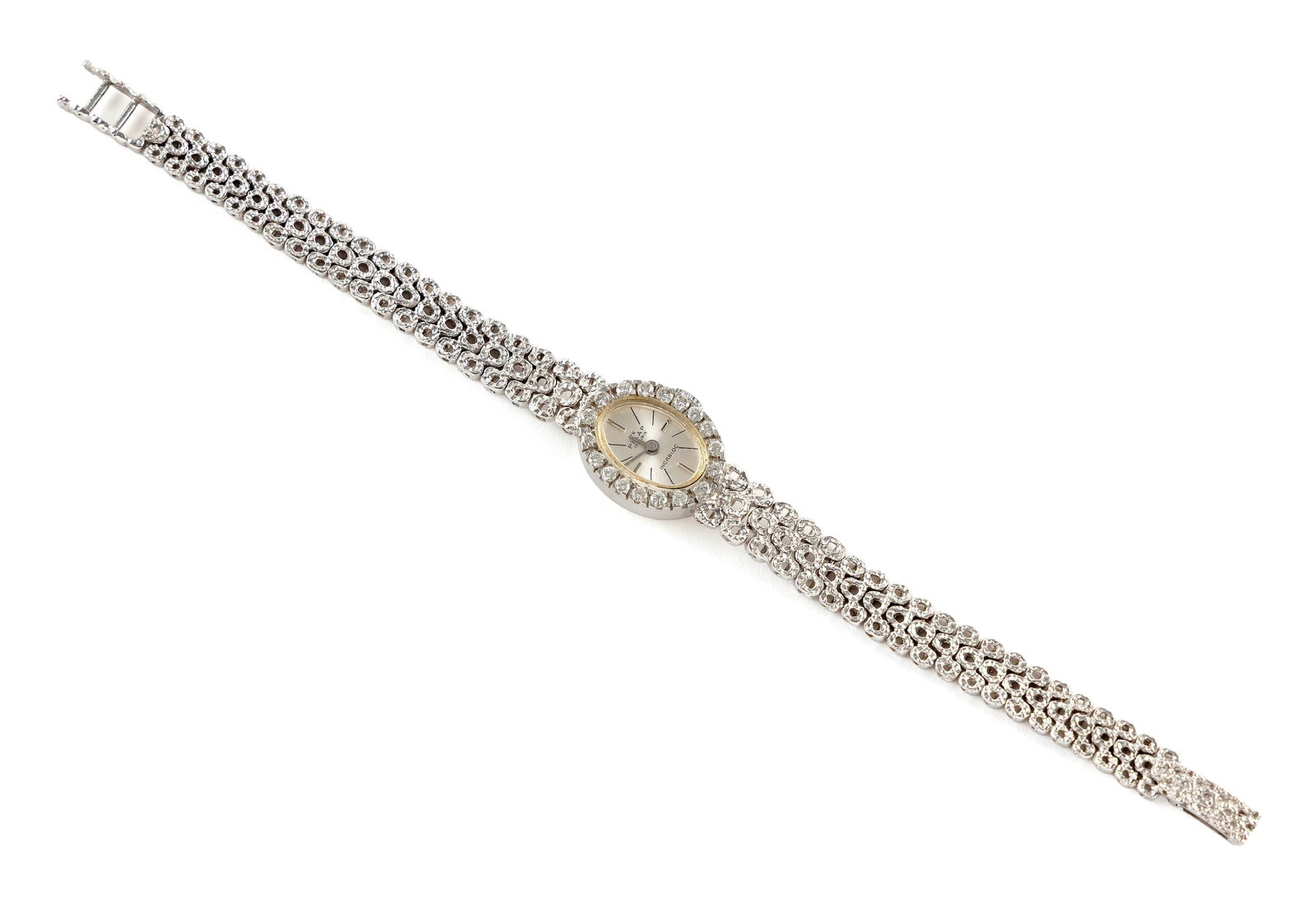 PIKAP 18KT WHITE GOLD AND DIAMOND WATCH Approx. 18.1 total dwt.: PIKAP 18KT WHITE GOLD AND DIAMOND WATCH Case with 18 small round-cut diamonds, approx. 0.50 ctw. Silver dial with silver markers. Manual wind 17-jewel movement. Stamped on inside of case. Case approx.