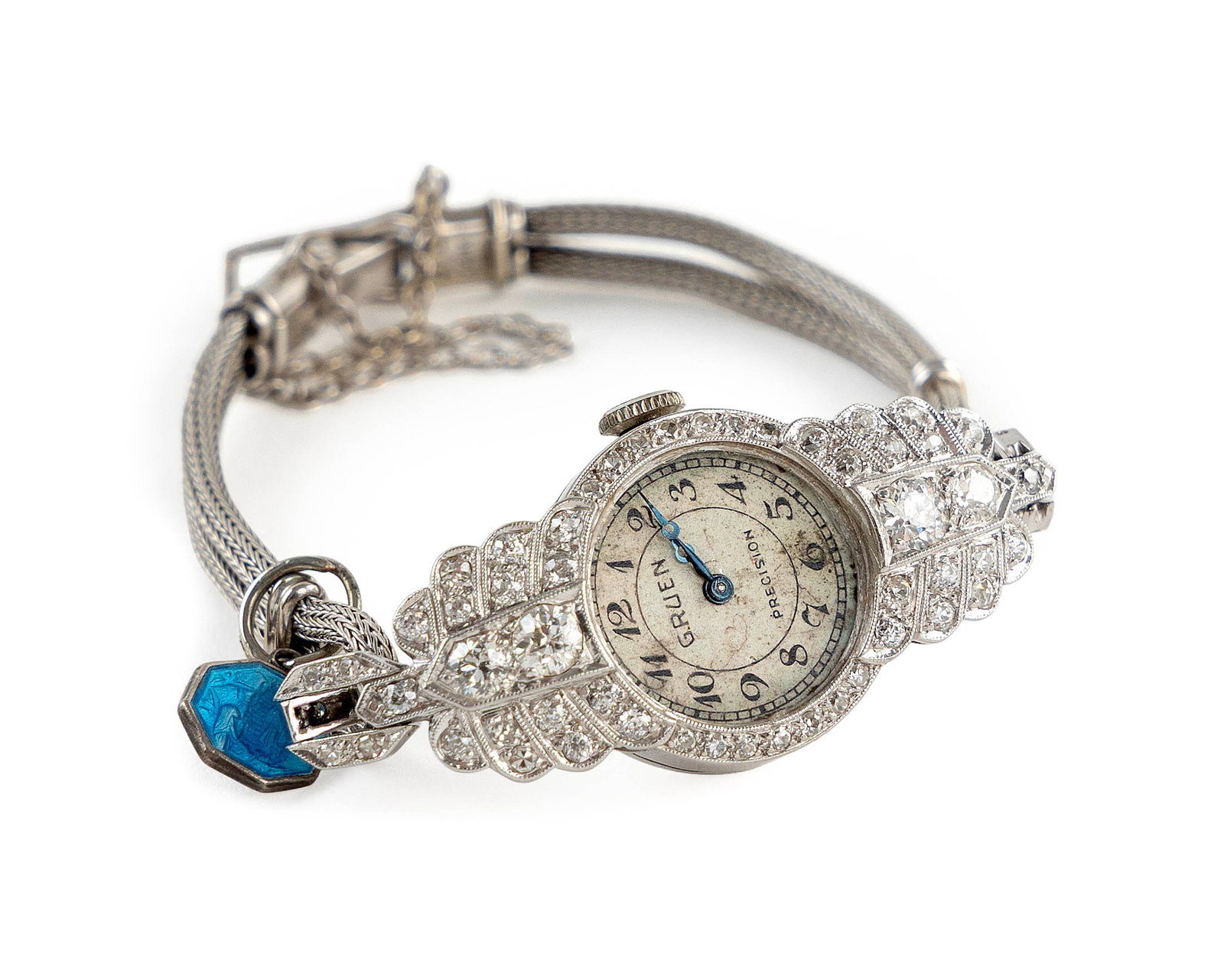 VINTAGE GRUEN PLATINUM, 14KT WHITE GOLD AND DIAMOND WATCH Approx. 11.5 total dwt.: VINTAGE GRUEN PLATINUM, 14KT WHITE GOLD AND DIAMOND WATCH Case with 32 round-cut diamonds and 30 small single-cut diamonds, approx. 1.00 ctw. White dial with black hands and black Arabic numerals. 14k