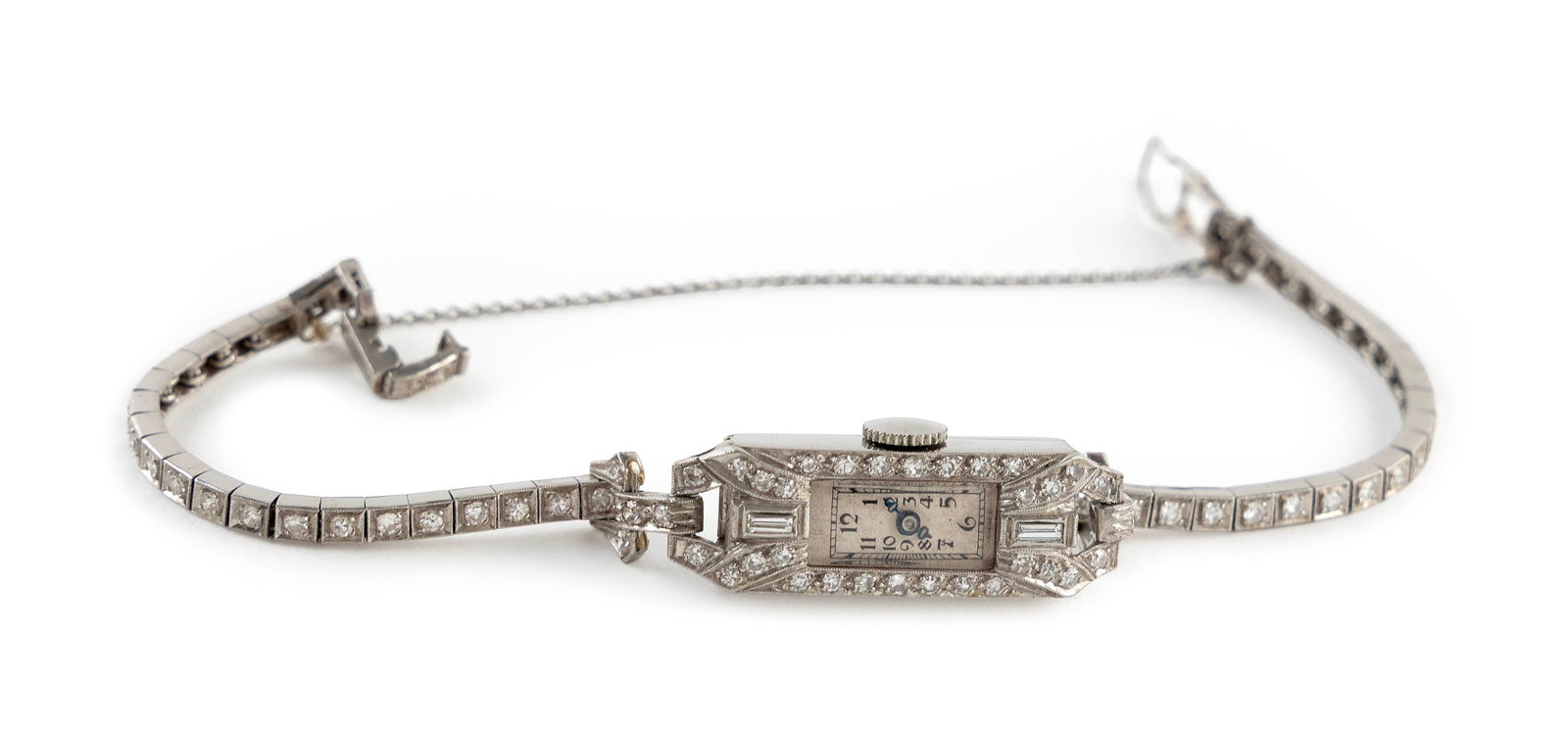 VINTAGE PLATINUM AND DIAMOND WATCH Approx. 11.8 total dwt.: VINTAGE PLATINUM AND DIAMOND WATCH Case with 30 small single-cut diamonds and two small straight-cut baguettes. Movement stamped "Hema Watch". Band with 51 small single-cut diamonds with attached safe