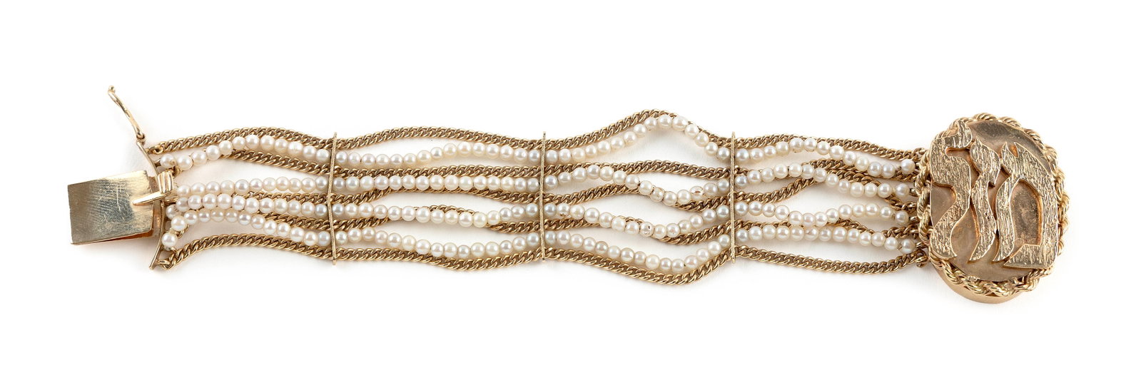 14KT YELLOW GOLD AND CULTURED PEARL BRACELET Approx. 23.4 total dwt.: 14KT YELLOW GOLD AND CULTURED PEARL BRACELET Five rows of small link chain and four rows of approx. 2.5mm seed pearls with three approx. 25.0mm spacers. Box style clasp, approx. 9.0 x 26.0 x 34.0mm, w