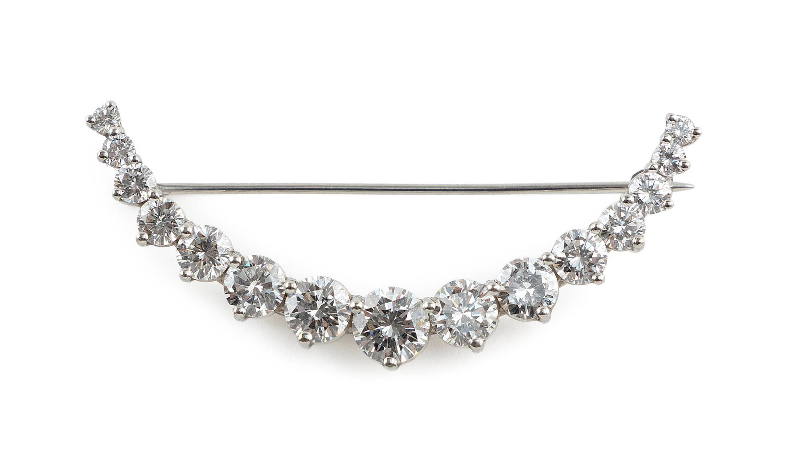 18KT WHITE GOLD AND DIAMOND PIN Approx. 4.0 total dwt.: 18KT WHITE GOLD AND DIAMOND PIN Custom crescent-shaped pin with 15 brilliant-cut diamonds from approx. 0.03ct. to 0.75 ct., approx. 2.85 ctw. Approx. 18.0 x 46.0mm. Approx. 4.0 total dwt.