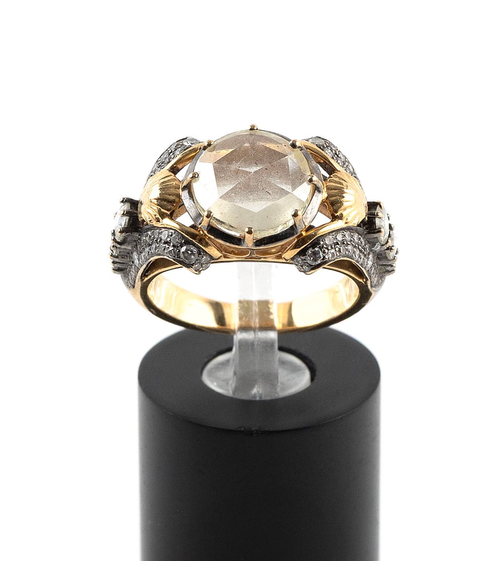 VINTAGE 18KT WHITE AND YELLOW GOLD AND DIAMOND RING Approx. 5.2 total dwt.: VINTAGE 18KT WHITE AND YELLOW GOLD AND DIAMOND RING One approx. 1.00 ct. rose-cut diamond and six small rose-cut diamonds down middle of the shank. Shank pav?d with small round diamonds, approx. 72 to